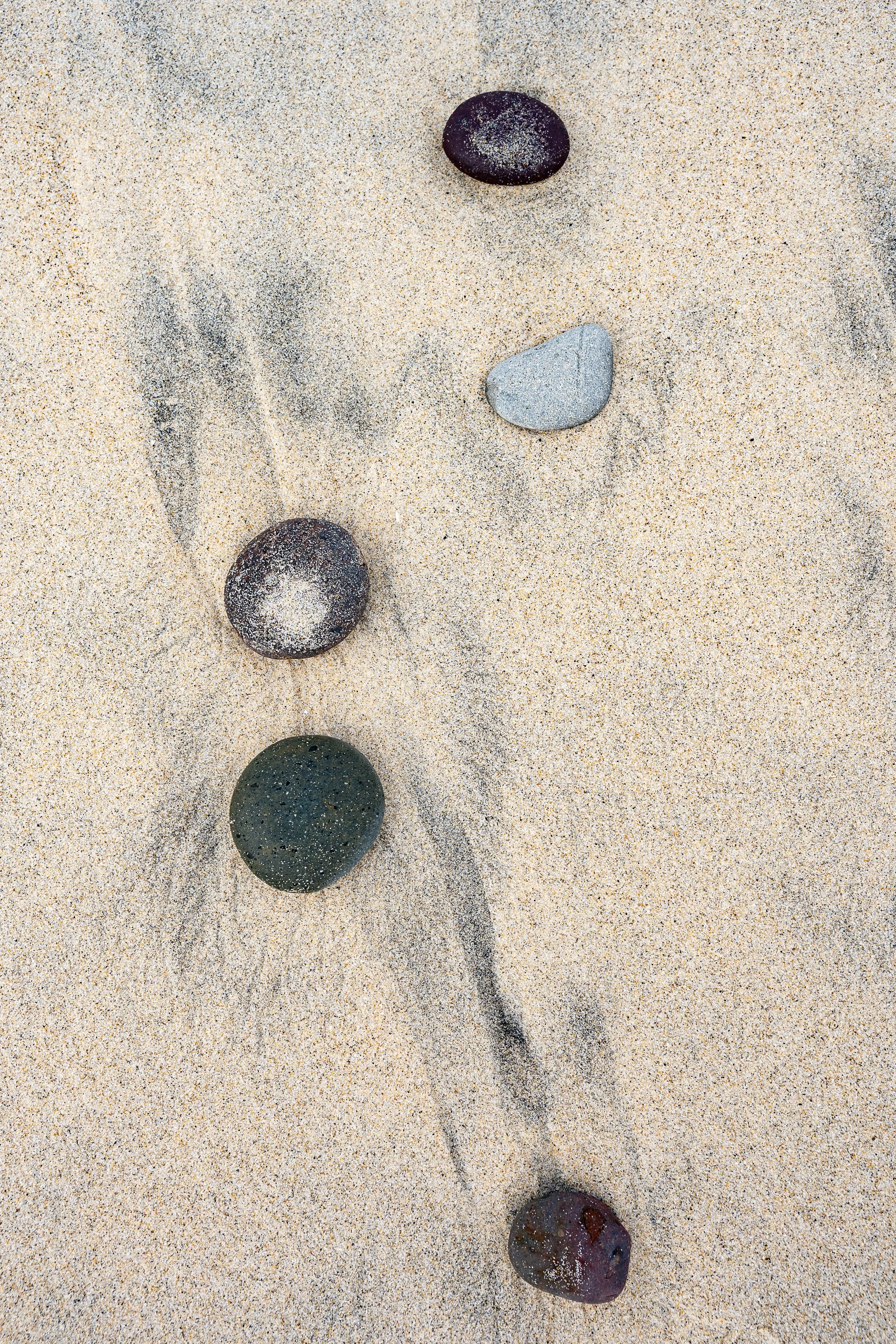 photo of rocks in beach  sand