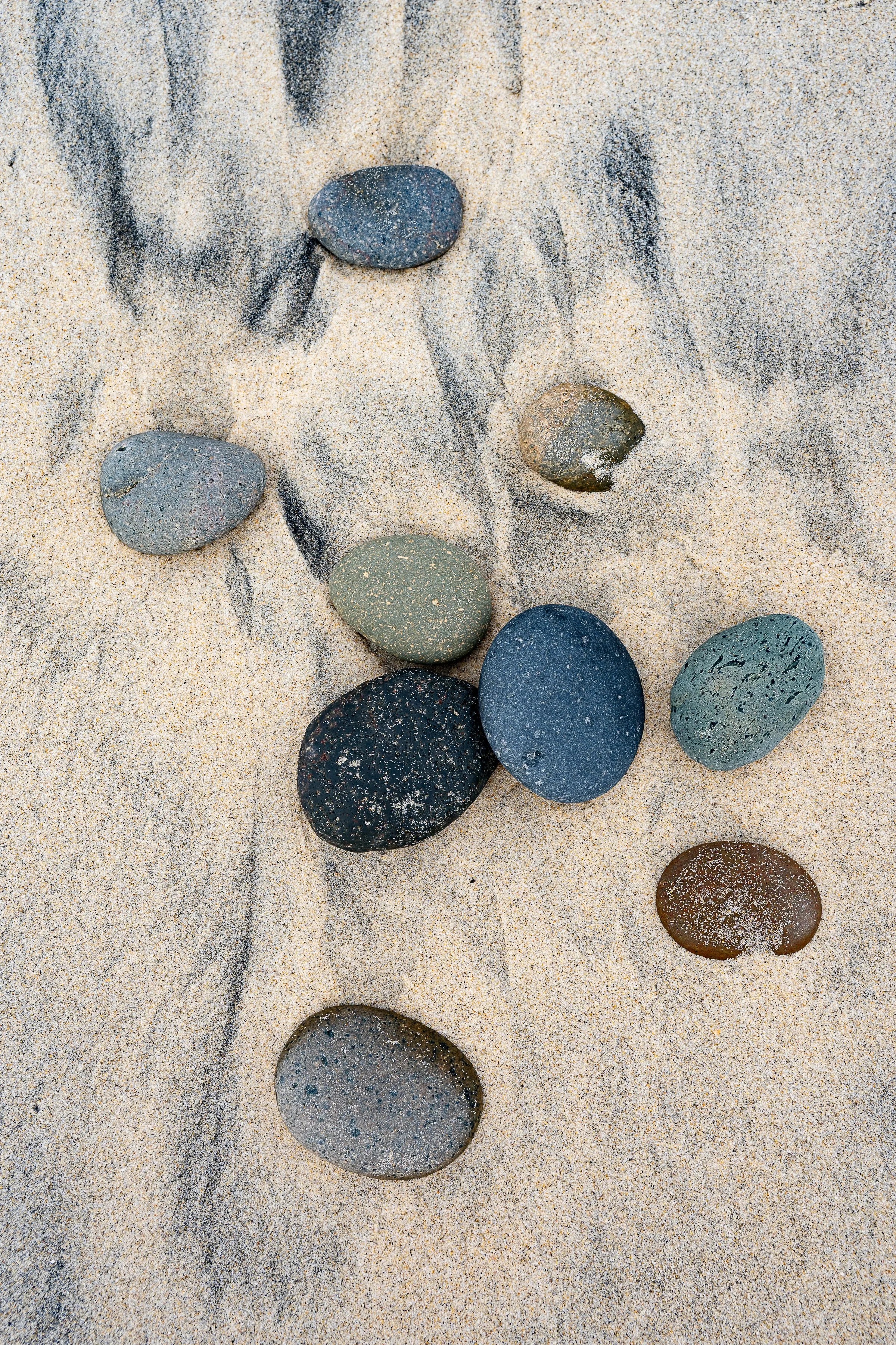 photo of rocks in beach  sand