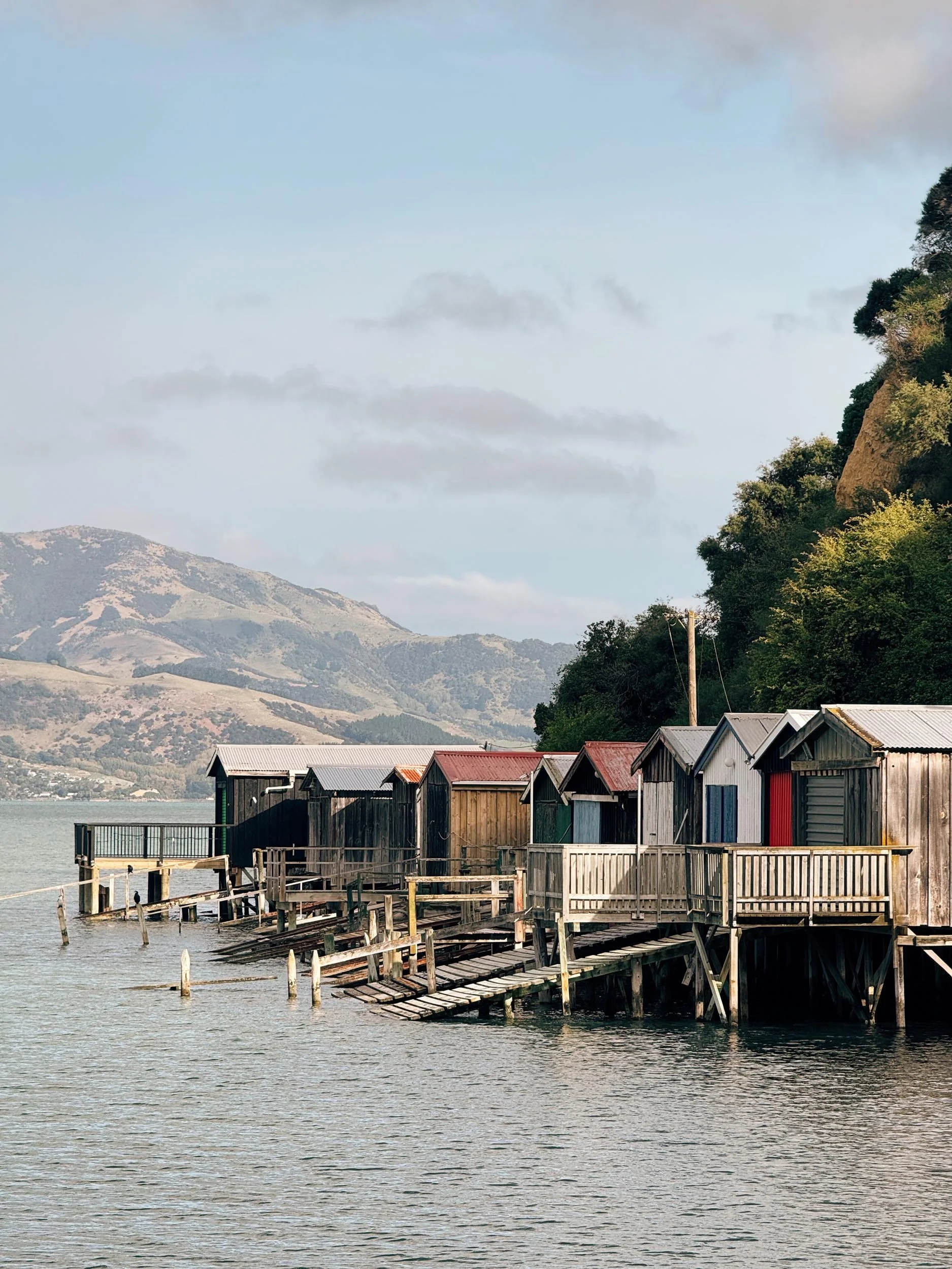 Duvauchelle boatsheds, Akaroa - copyright photography Julia Atkinson-Dunn