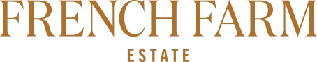 Text reading 'French Farm Estate' in a decorative font on a black background.