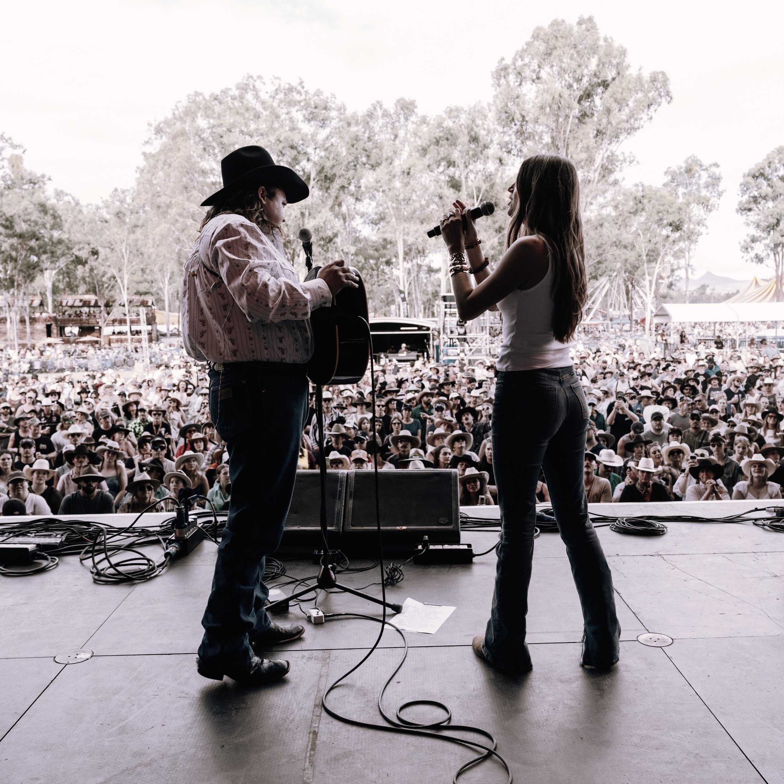 Jake Worthington and Lauren Watkins onstage together at CMC Rocks Festival in QLD, in March 2026.