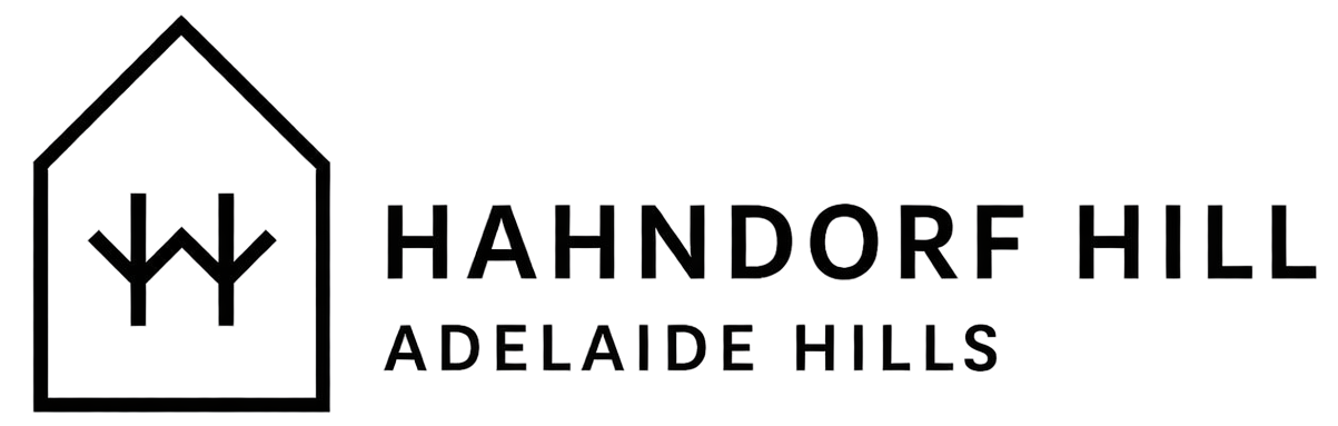 Logo for Handorf Hill Adelaide Hills, featuring a house shape with a stylized tree inside