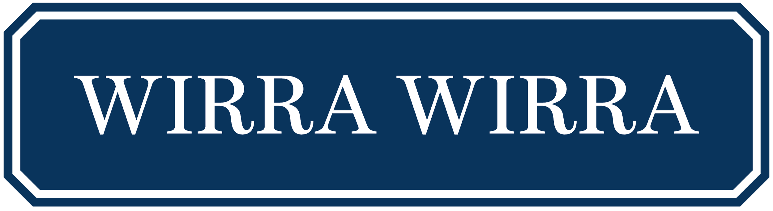 A street sign with a dark blue background and white text that reads 'WIRA WIRA'.