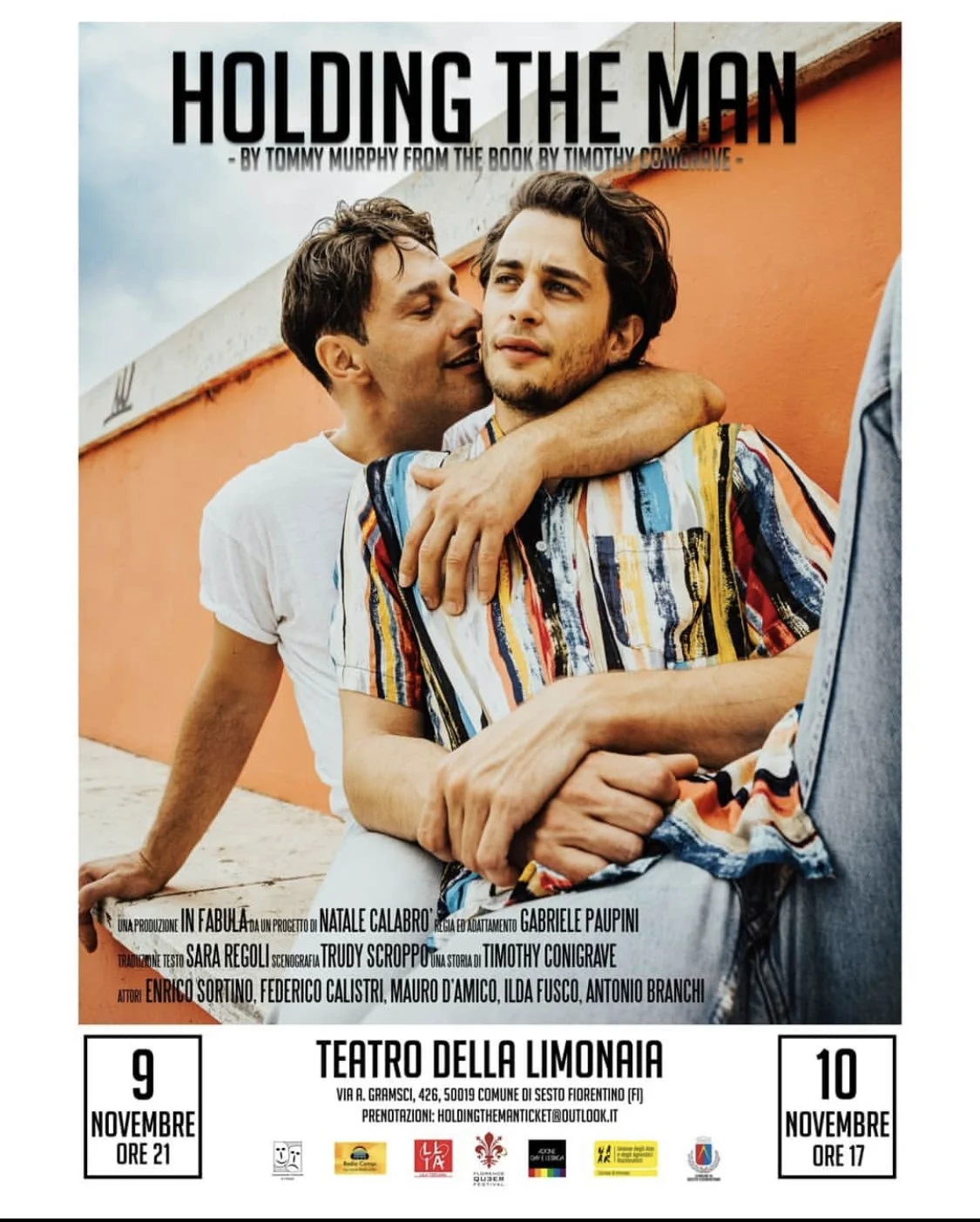 Poster for a theatrical play called 'Holding the Man', showing two men in an intimate embrace against an orange wall. Text includes details about the show dates, location, and production team.