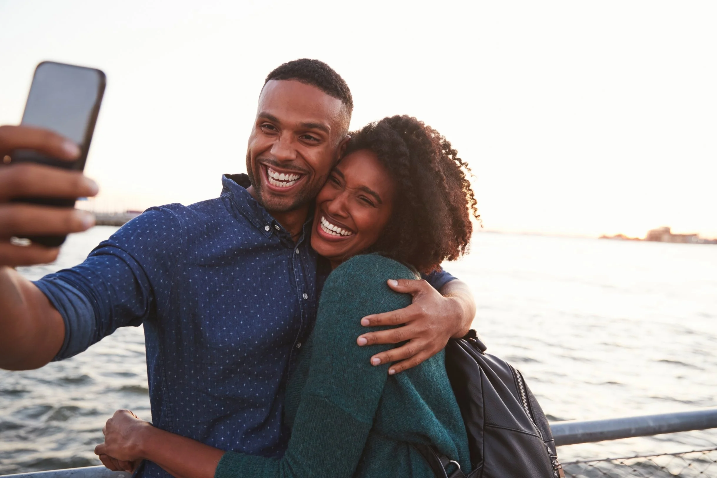 Couple holding hands during a counseling session, representing relationship therapy in New Jersey