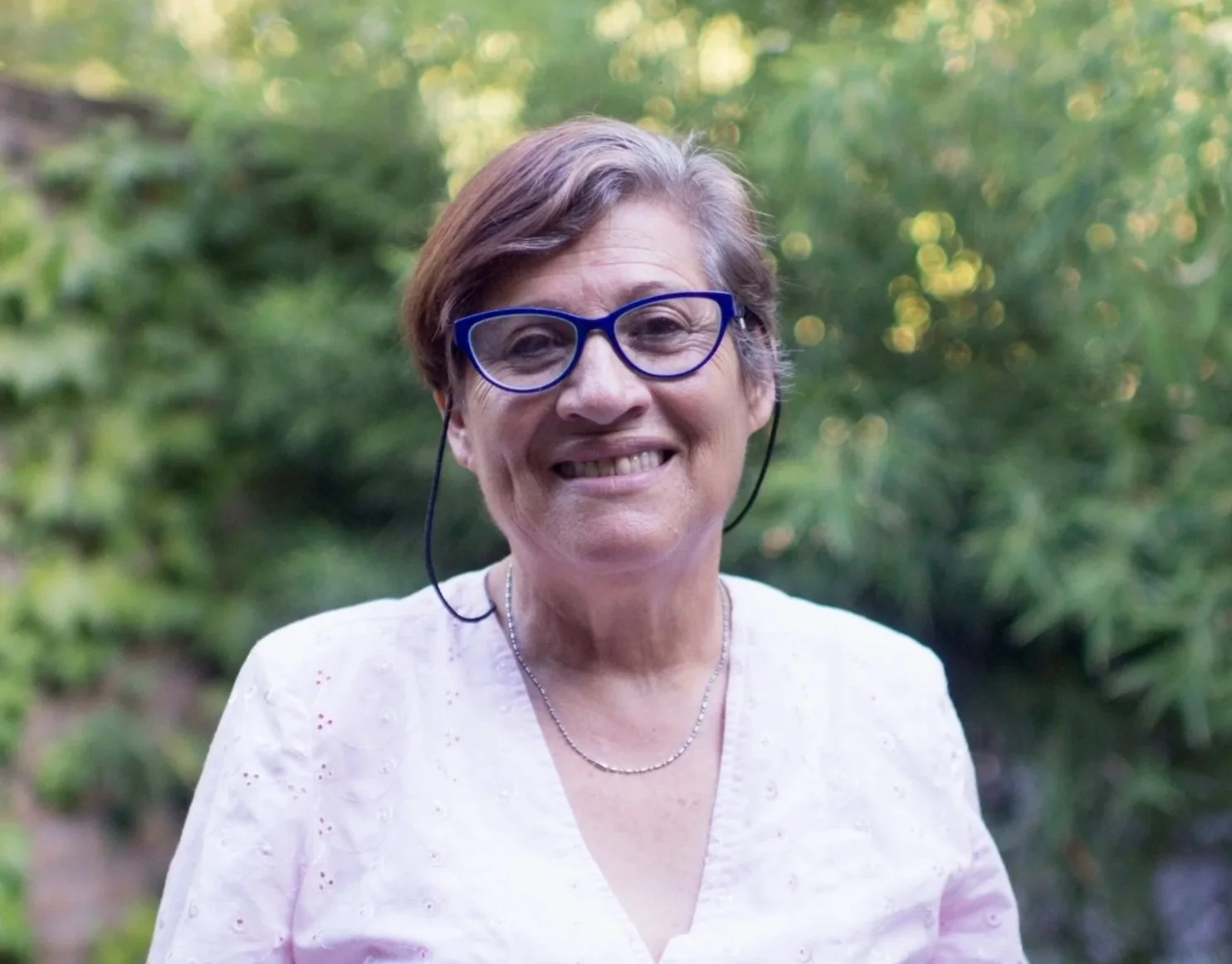 Portrait of a smiling woman representing compassionate individual therapy in New Jersey.