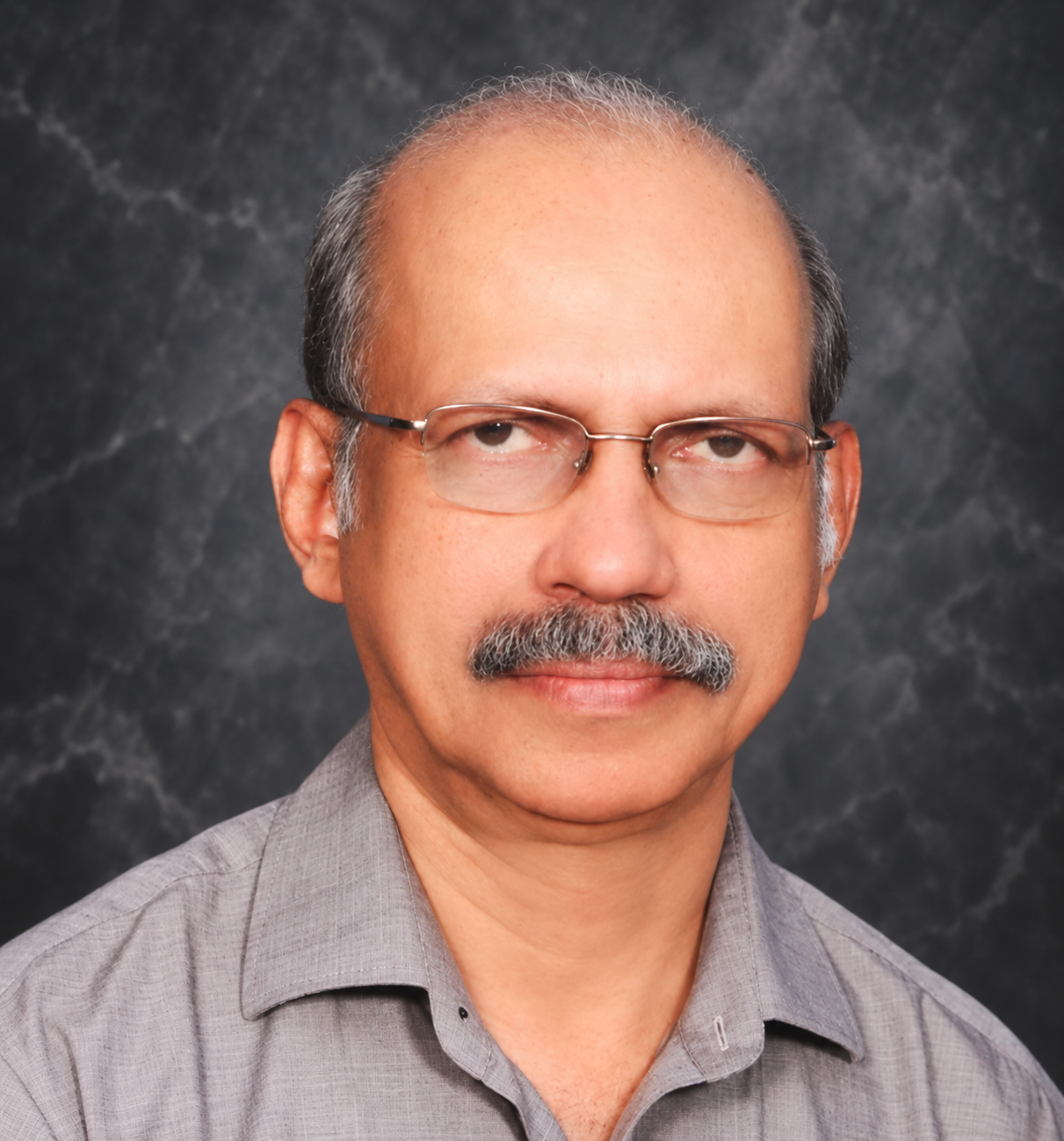 Dr Harish P