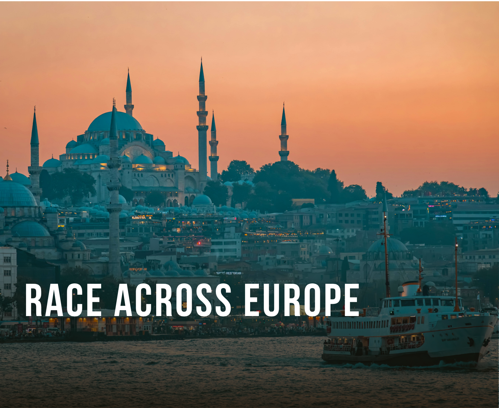 Sunset over Istanbul with the Hagia Sophia and mosques in the background, boats on the water in the foreground.