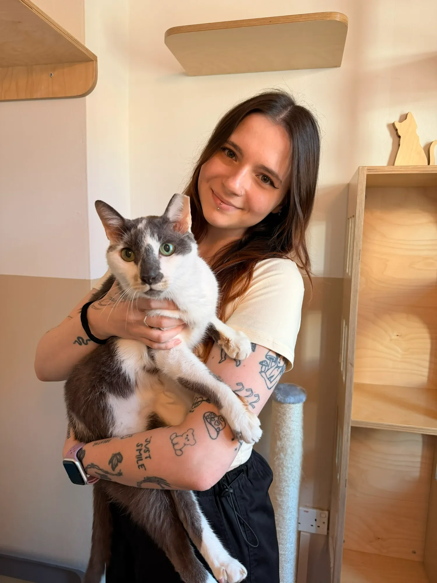 A Shangri-Paw cat care team member on shift in Singapore