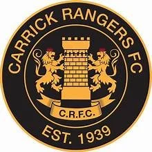 The crest of Garrick Rangers FC with two lions on either side of a castle tower, surrounded by the team name and established date 1939.