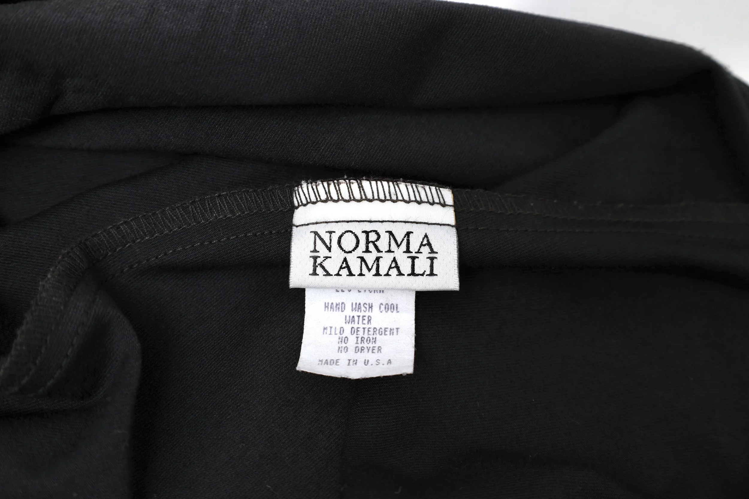 1990s Norma Kamali OMO label tag