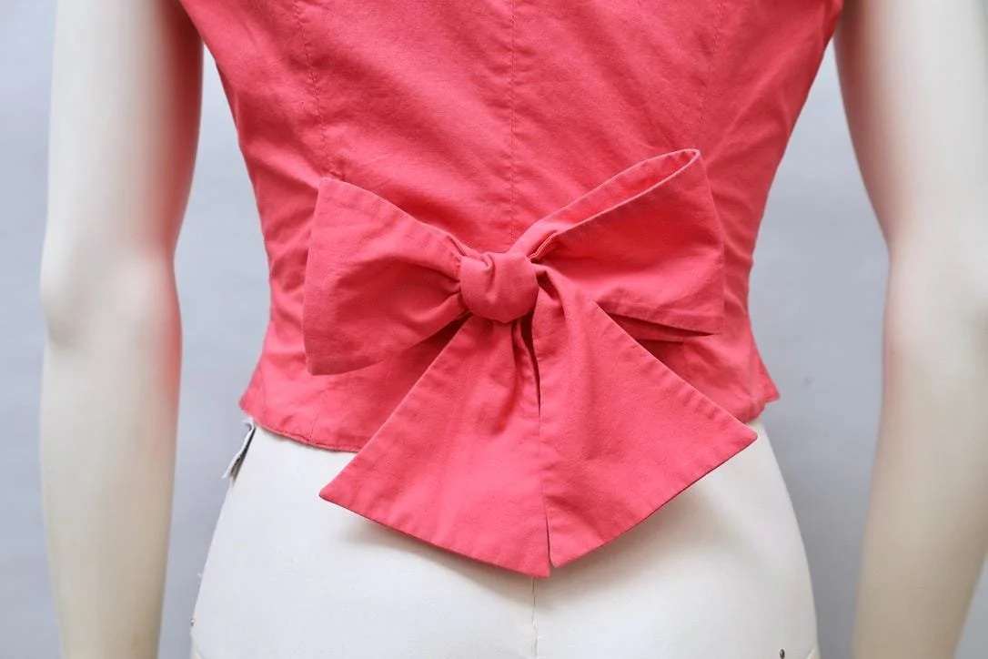 S/S 1989 Chantal Thomass pink cotton and black lace vest bow