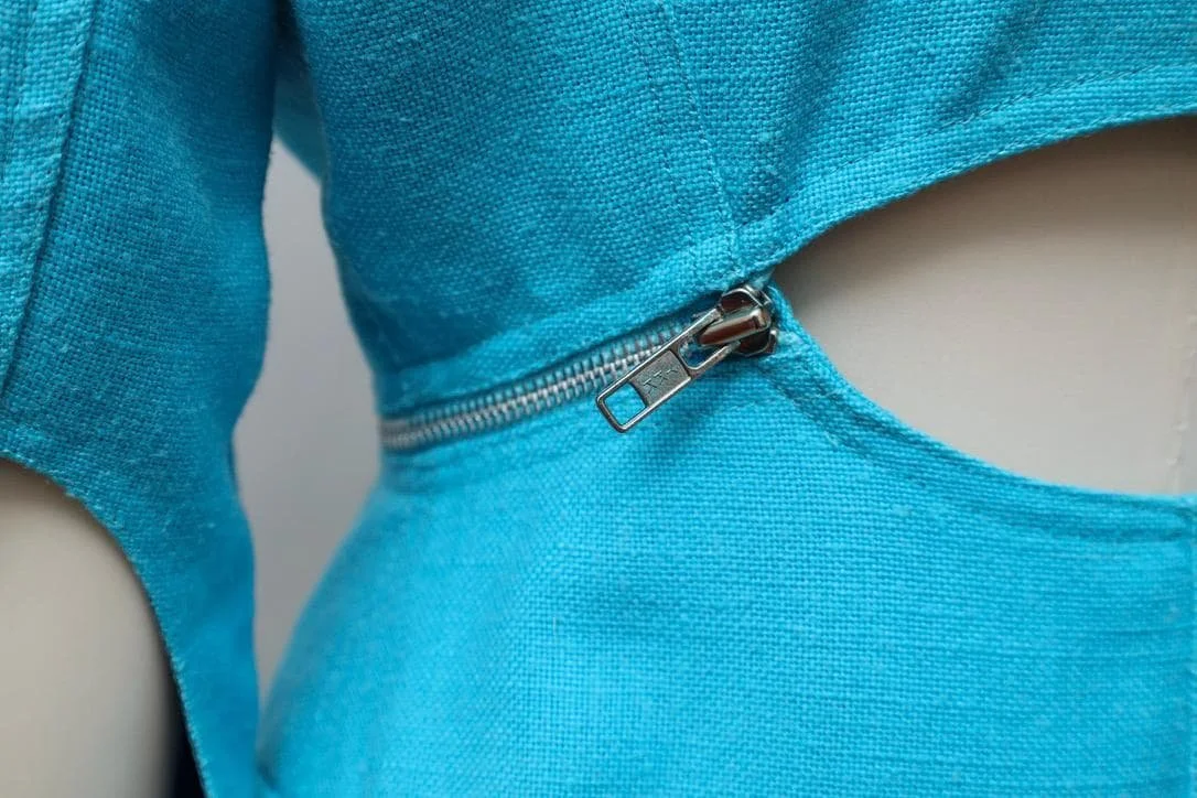 1980s Tramway Paris turquoise cut-out blazer with side zipper