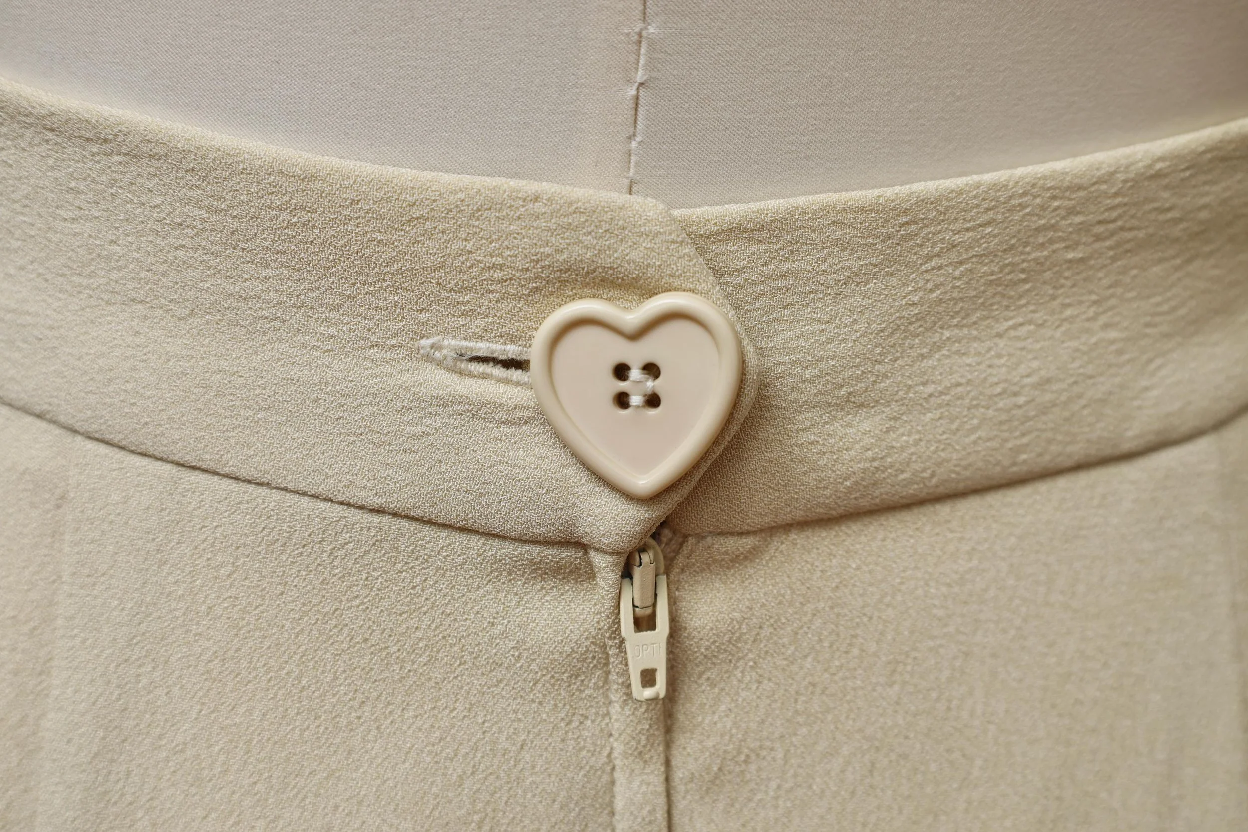 2000s Moschino Cheap and Chic beige heart button