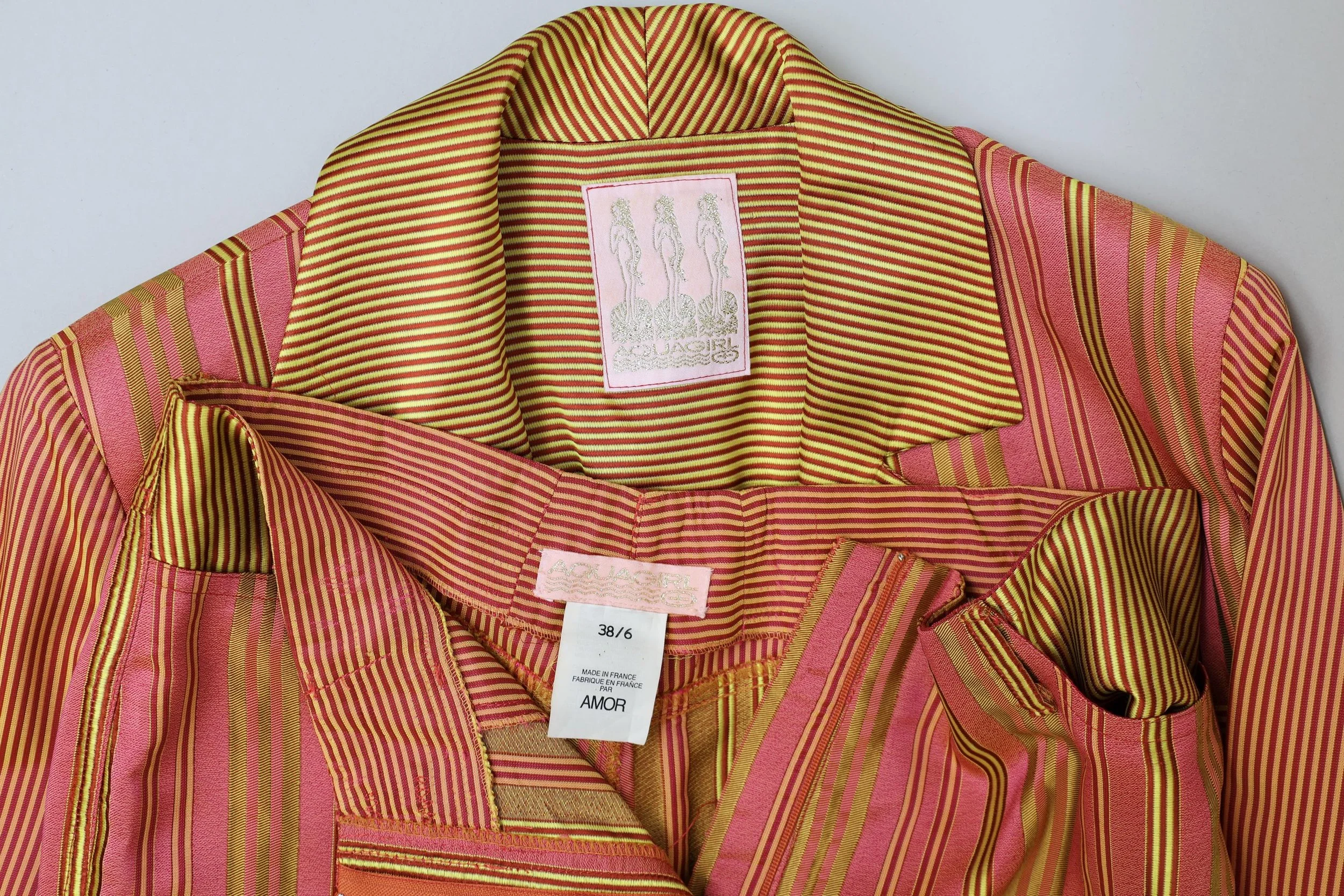 1990s Aquagirl by Fayçal Amor label tag