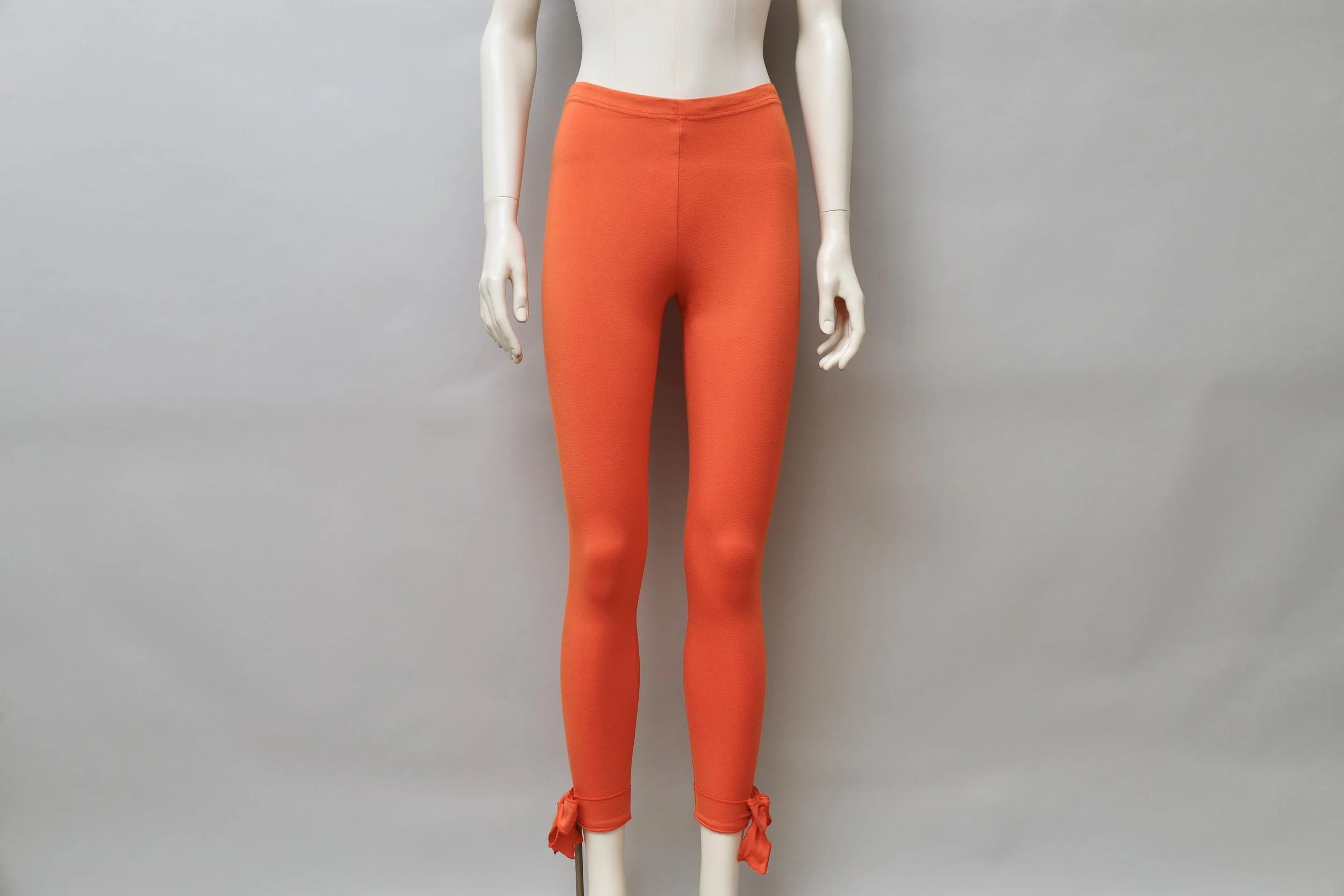 1990s Chantal Thomass orange ribbon hem leggings