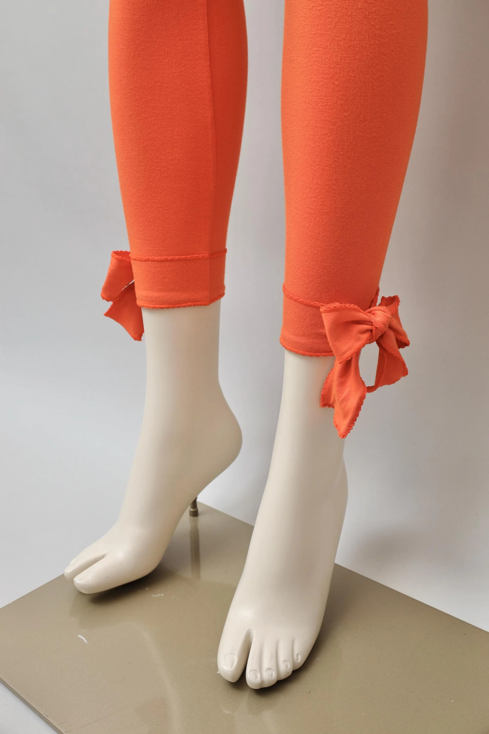 1990s Chantal Thomass orange ribbon hem leggings