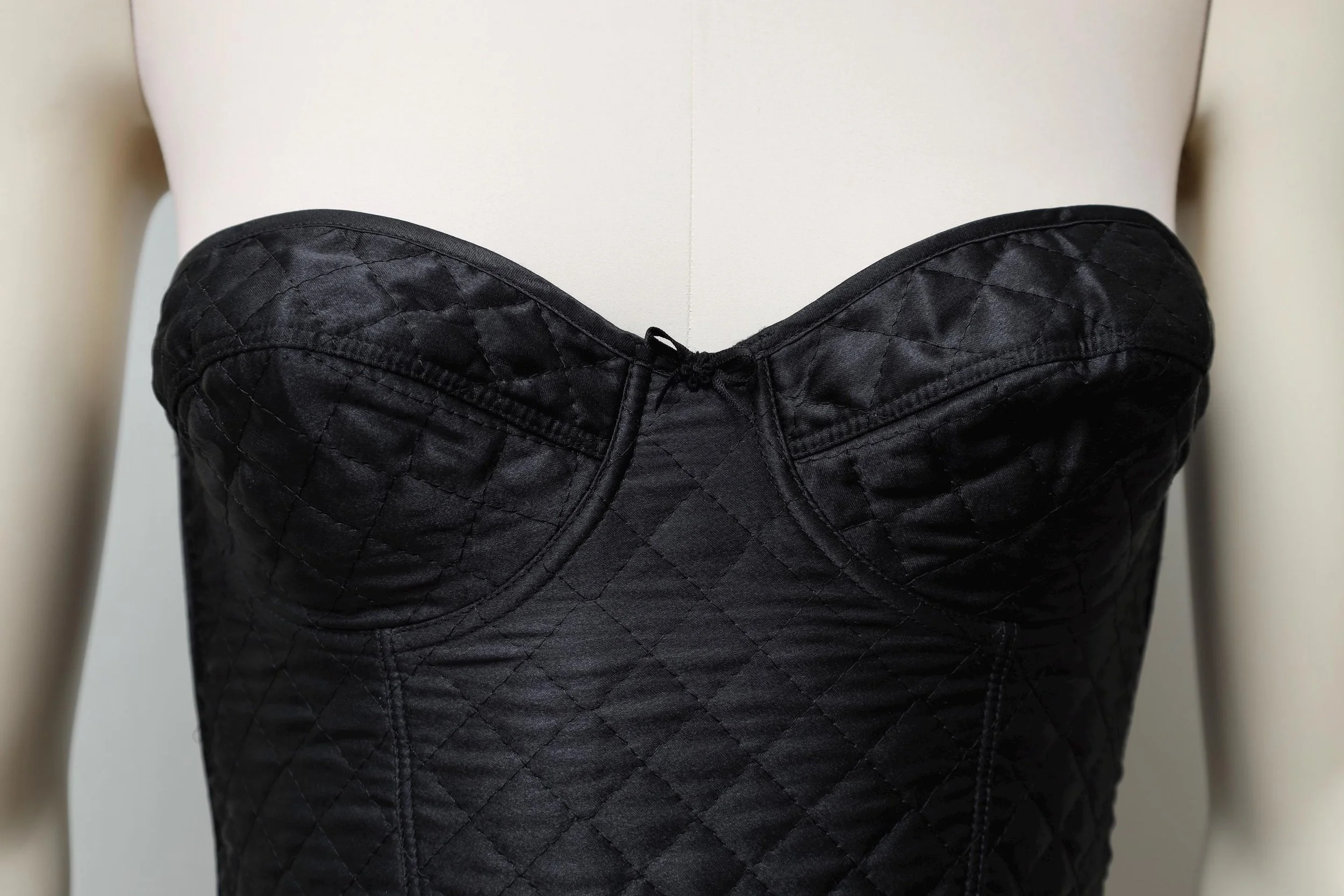 1990s Occhi Verdi quilted black satin bustier top