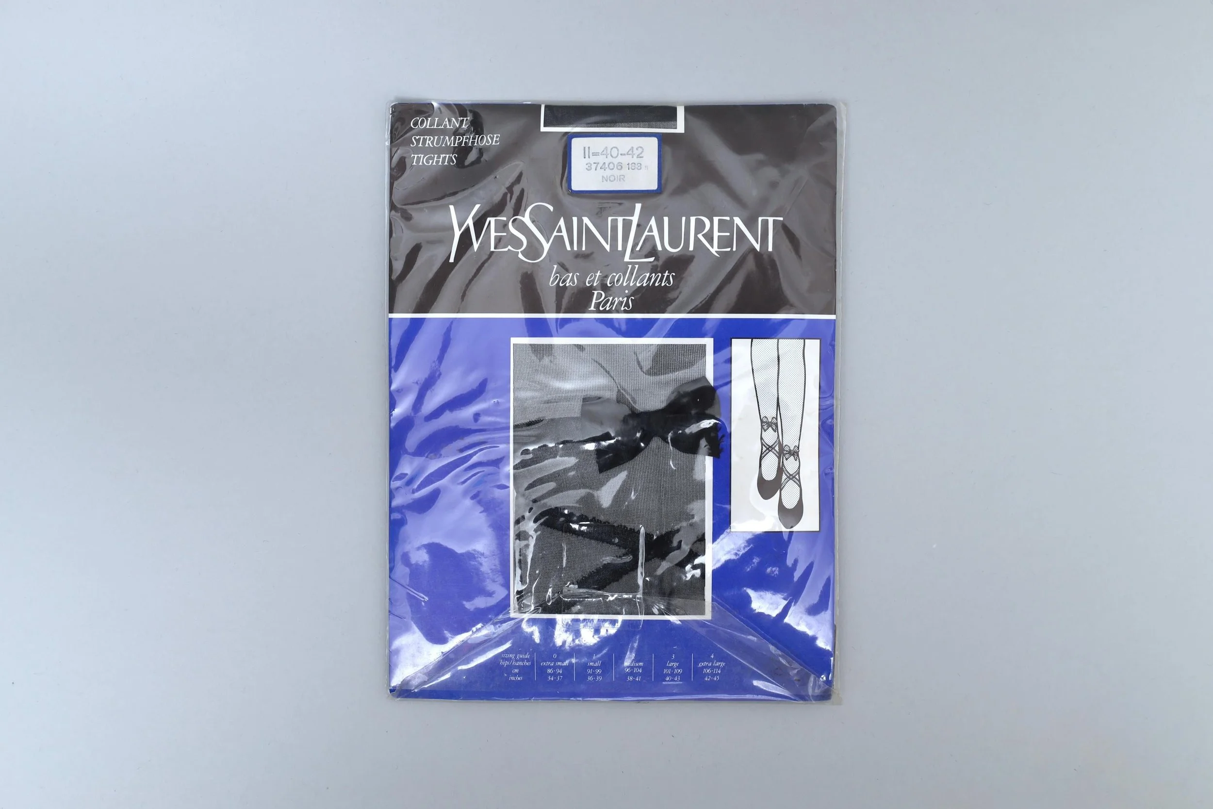 Deadstock Yves Saint Laurent black nylon tights with bow design