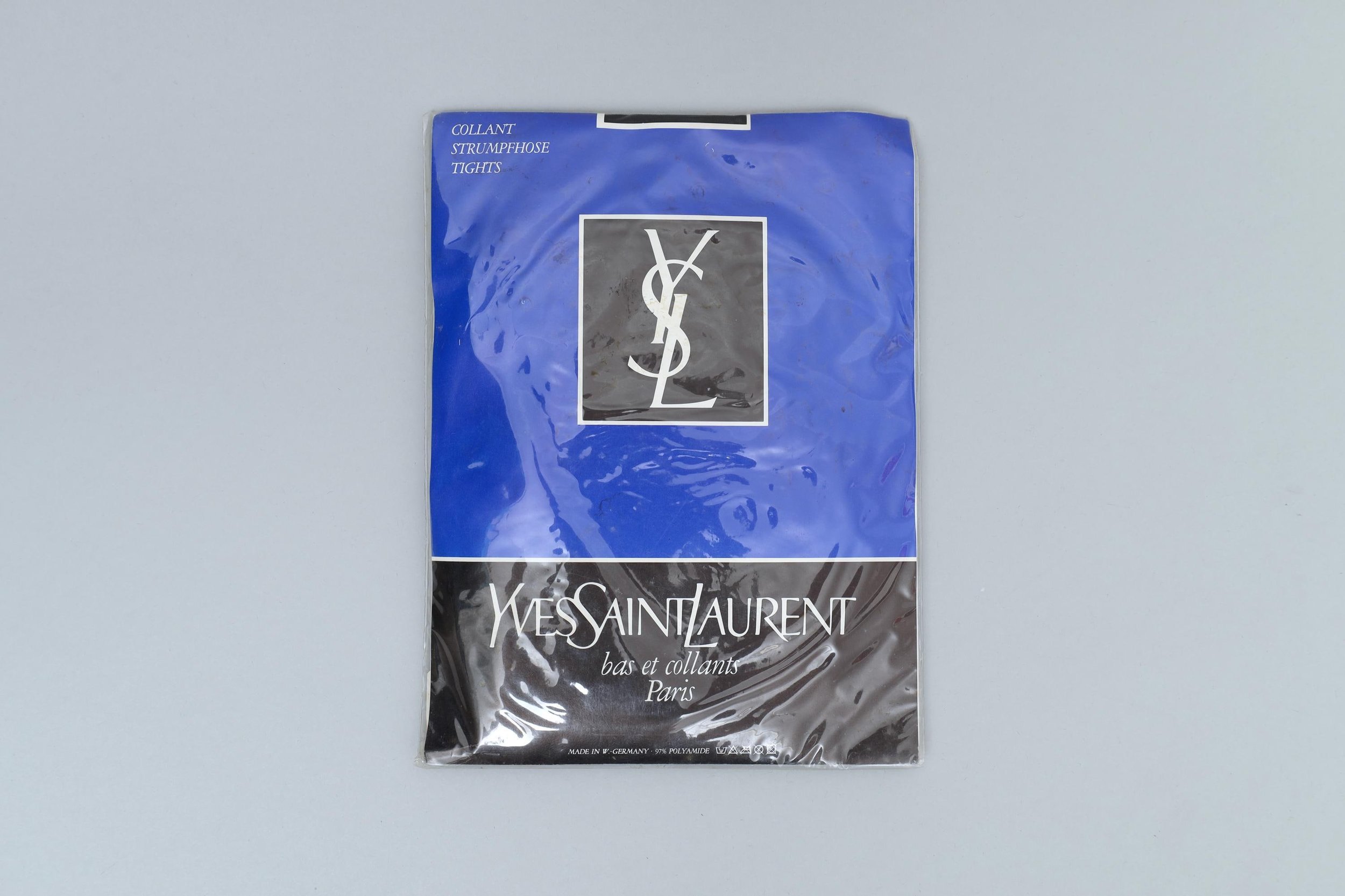 Deadstock Yves Saint Laurent black nylon tights with bow design