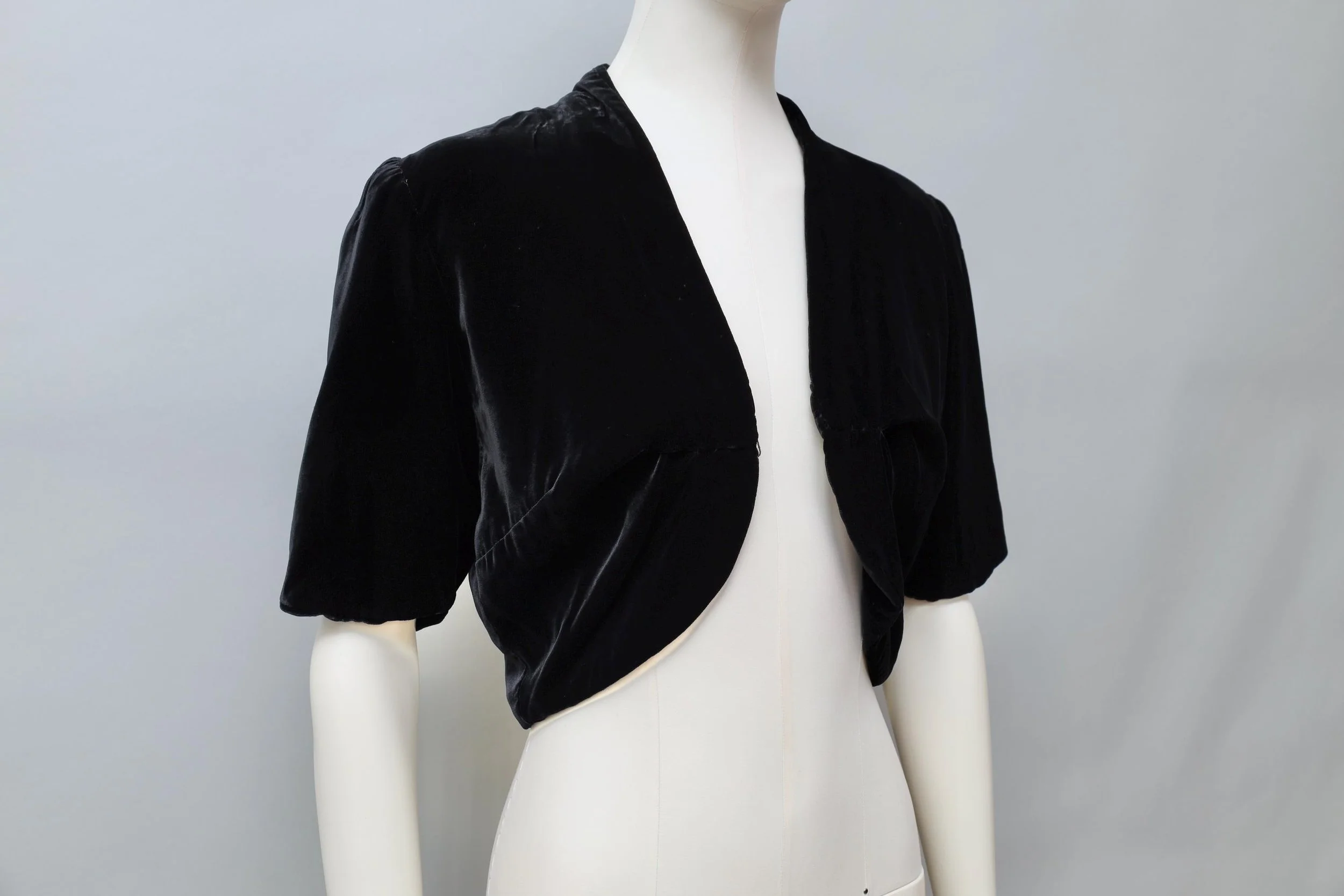 1980s Norma Kamali black rayon velvet shrug