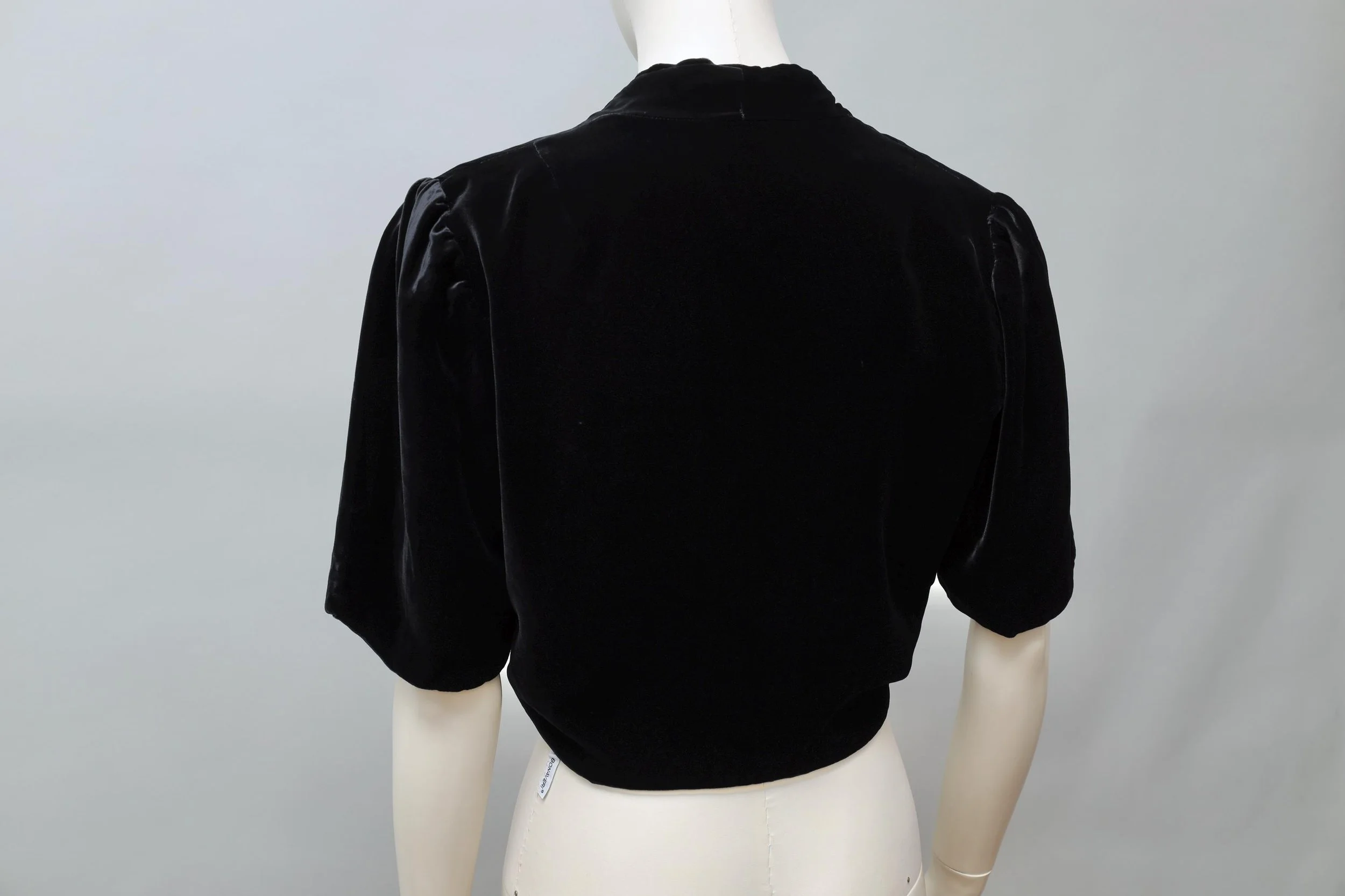 1980s Norma Kamali black rayon velvet shrug