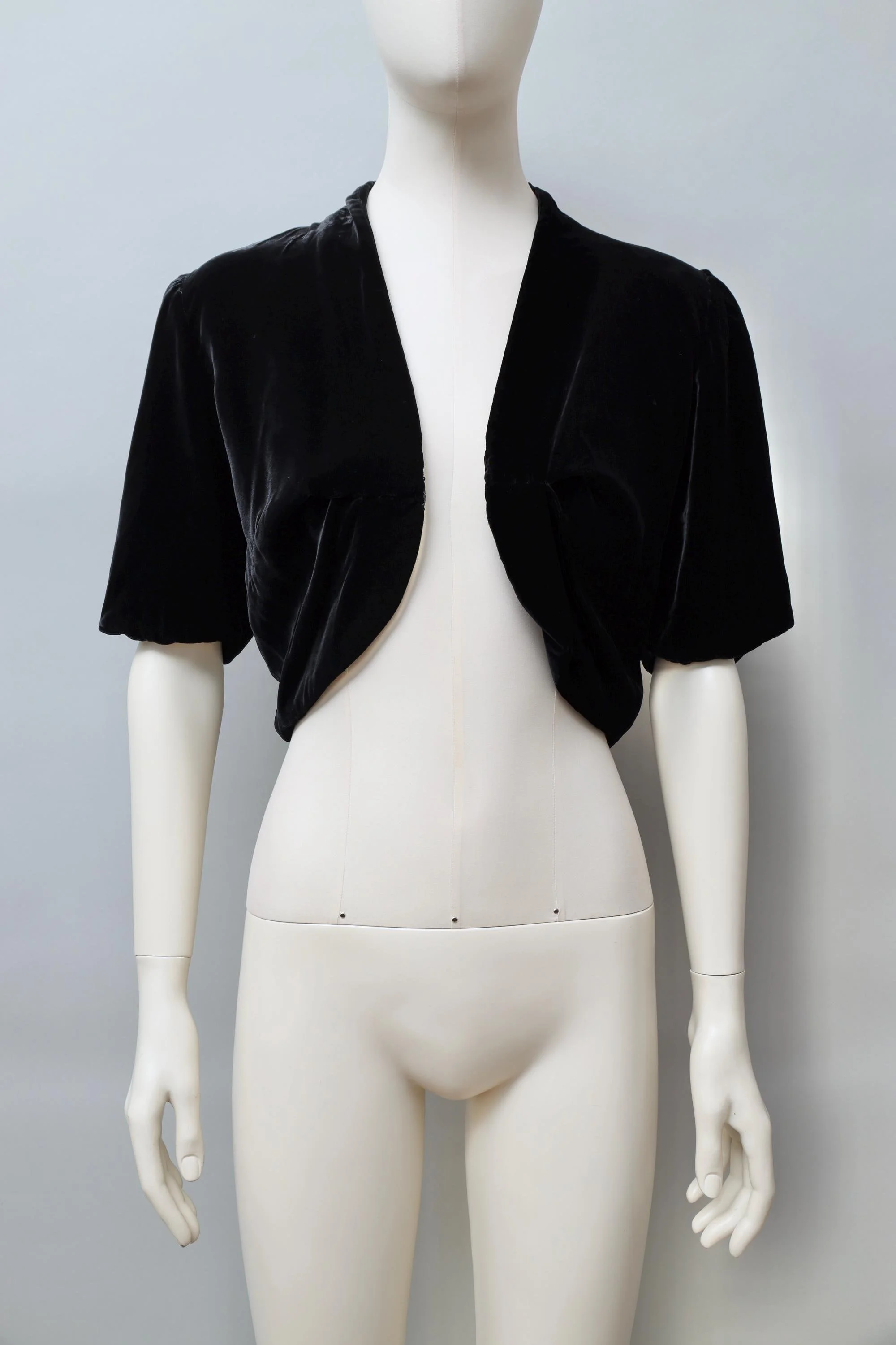 1980s Norma Kamali black rayon velvet shrug