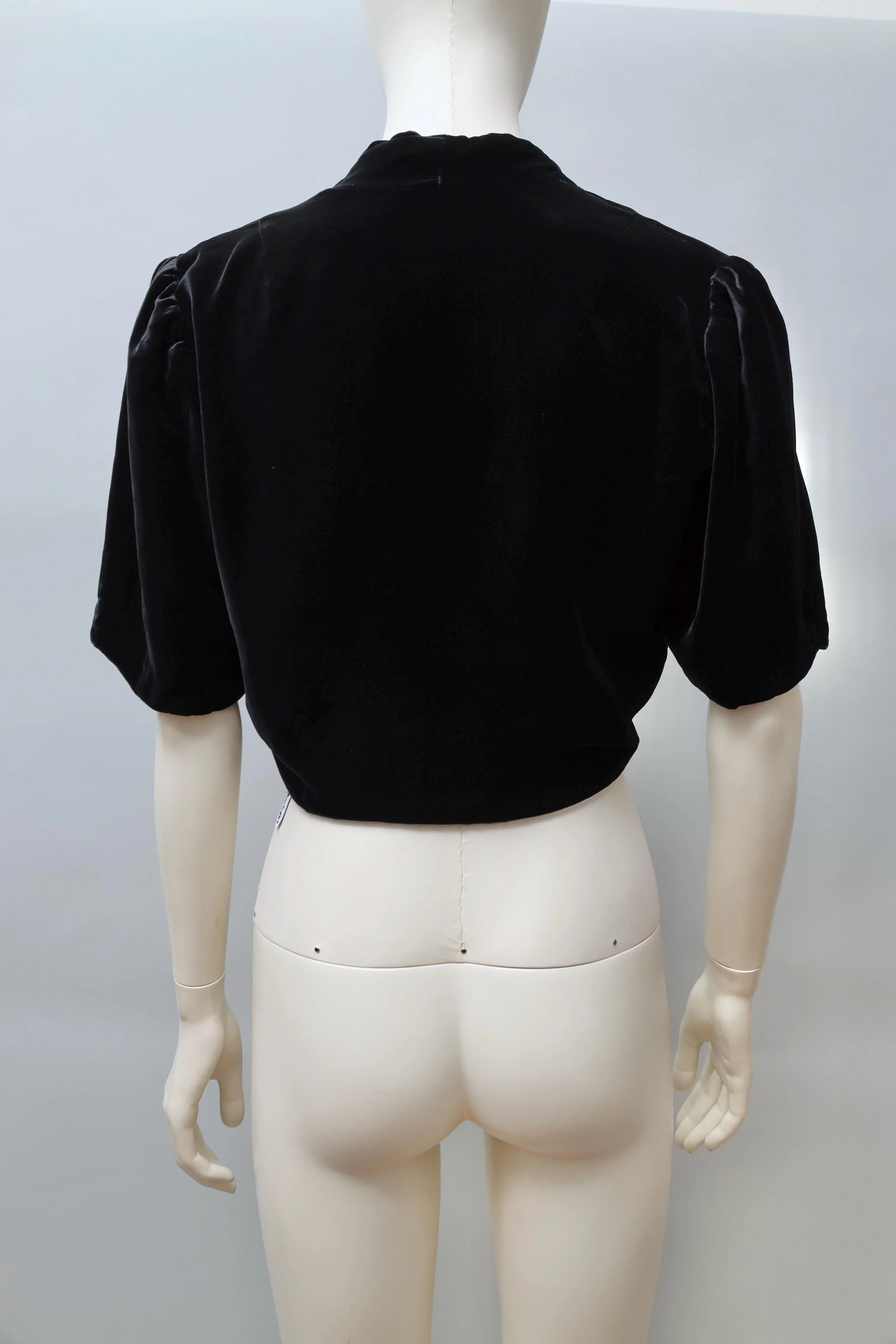 1980s Norma Kamali black rayon velvet shrug