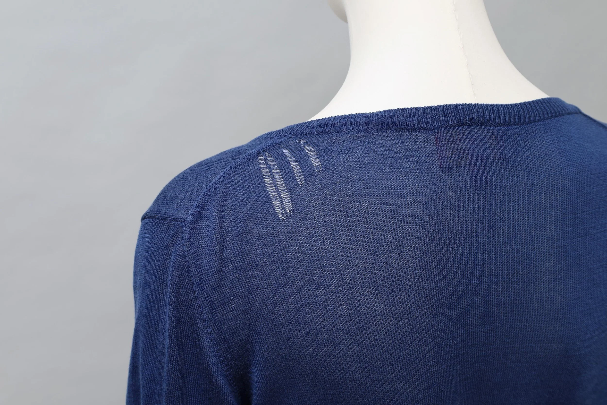 navy blue short sleeved cardigan shoulder runs