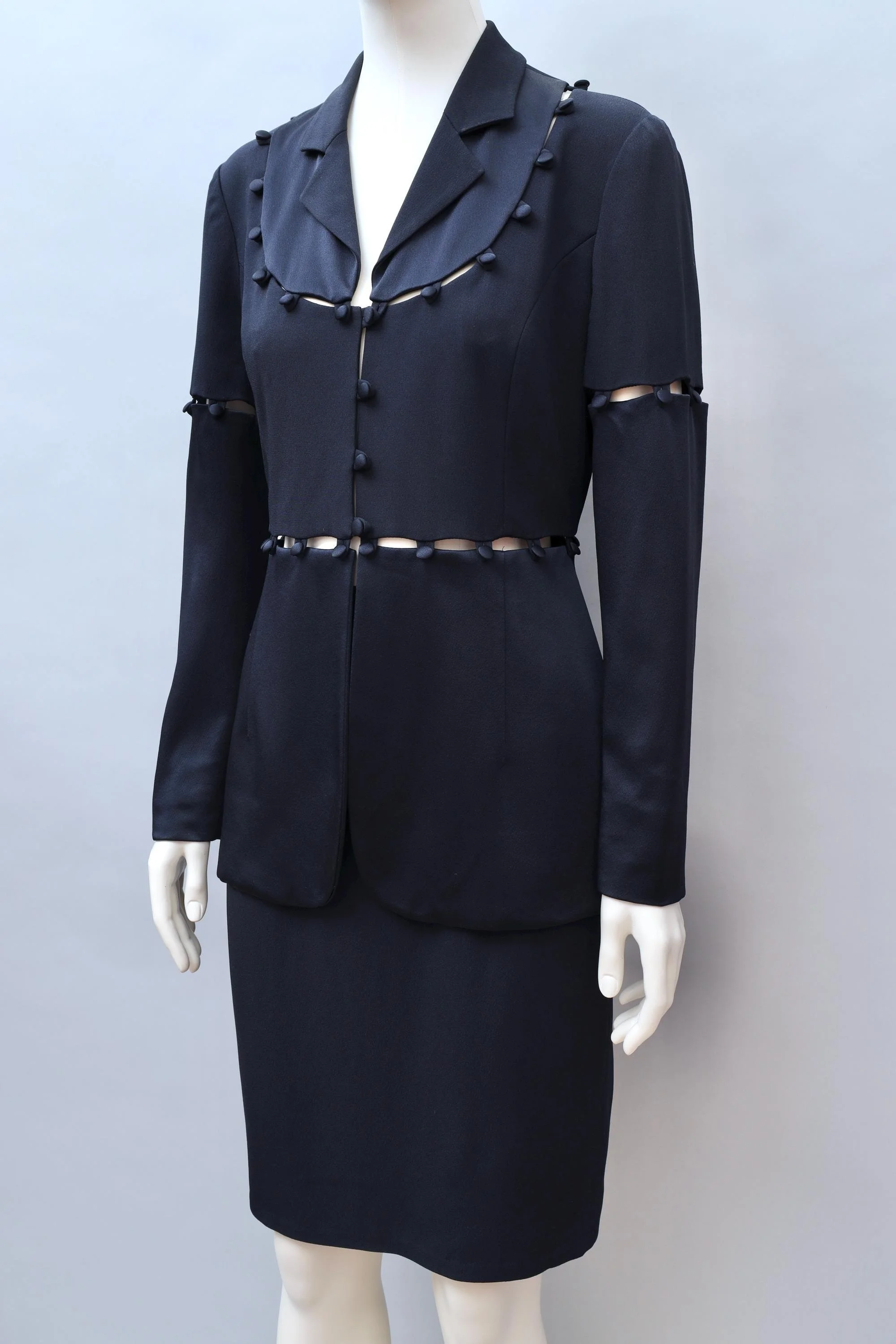 early 1990s Moschino Cheap and Chic midnight blue puzzle blazer and skirt ensemble