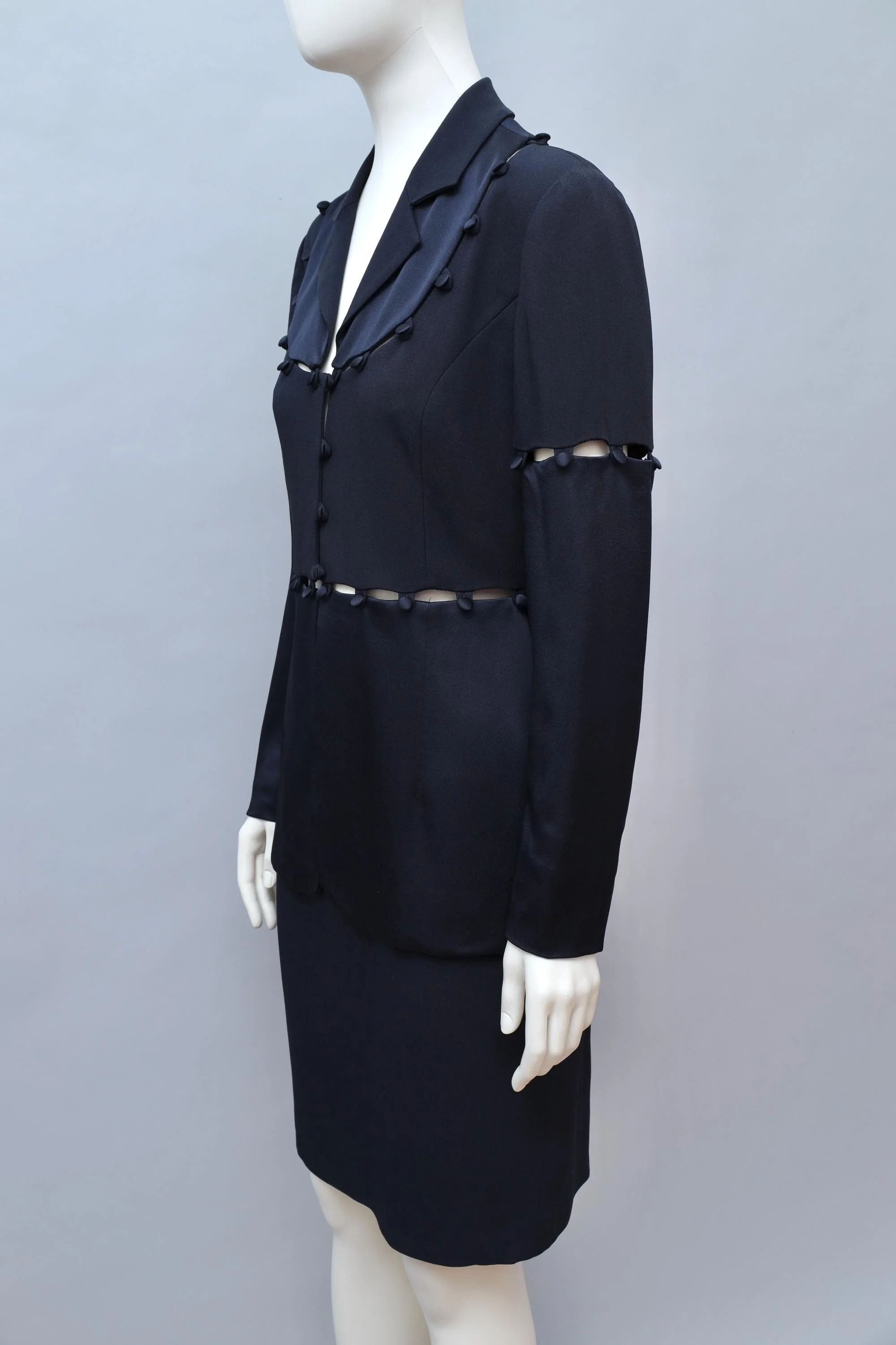 early 1990s Moschino Cheap and Chic midnight blue puzzle blazer and skirt ensemble