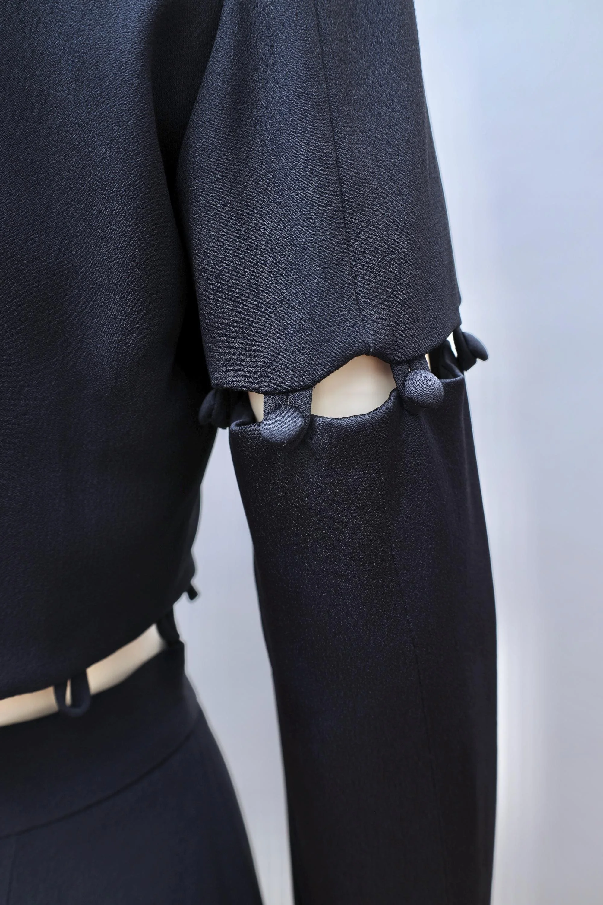 early 1990s Moschino Cheap and Chic midnight blue puzzle blazer and skirt ensemble