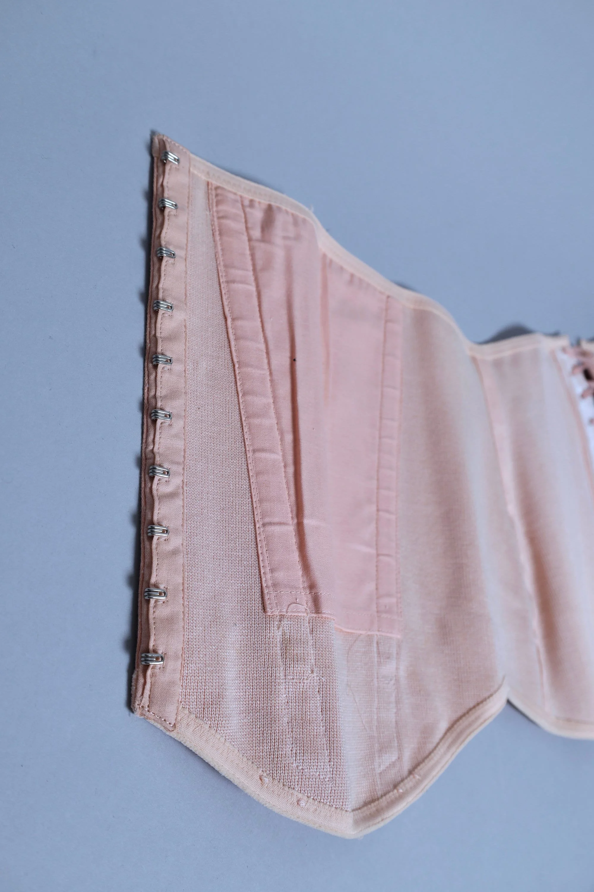 1960s Vintage French deadstock peach pink surgical corset