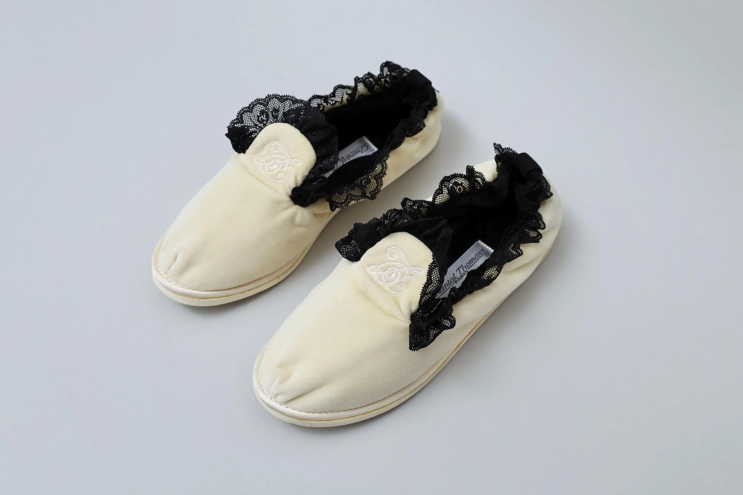 1990s deadstock Chantal Thomass cream velvet and black lace house slippers
