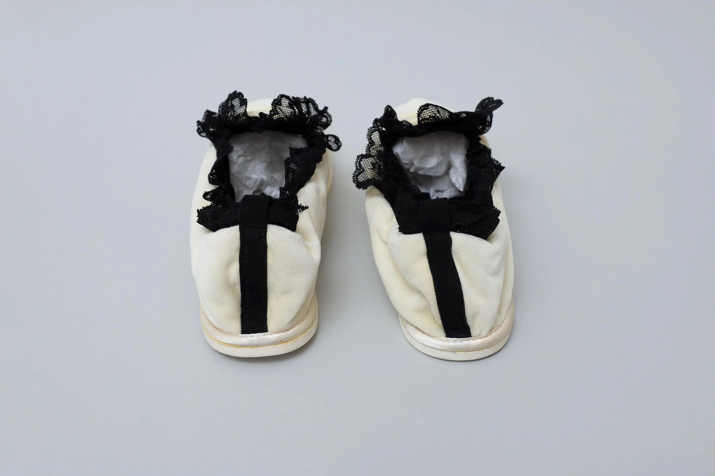 1990s deadstock Chantal Thomass cream velvet and black lace house slippers