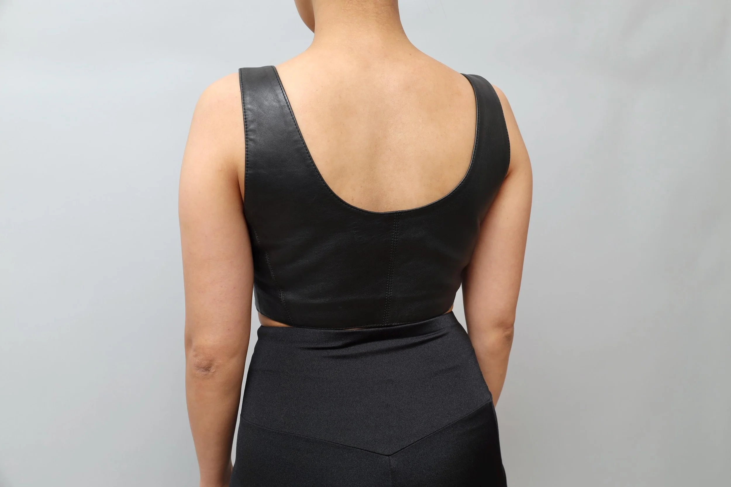 1990s Michel Klein black leather lace up front bra top
