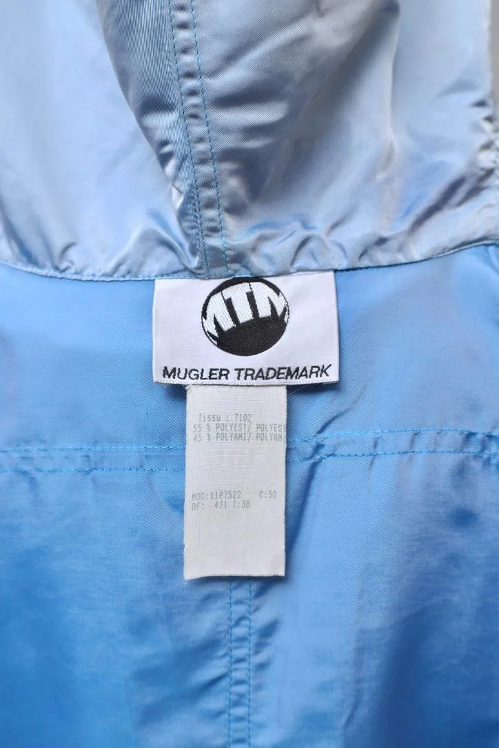 1990s MTM Mugler Trademark metallic blue label tag