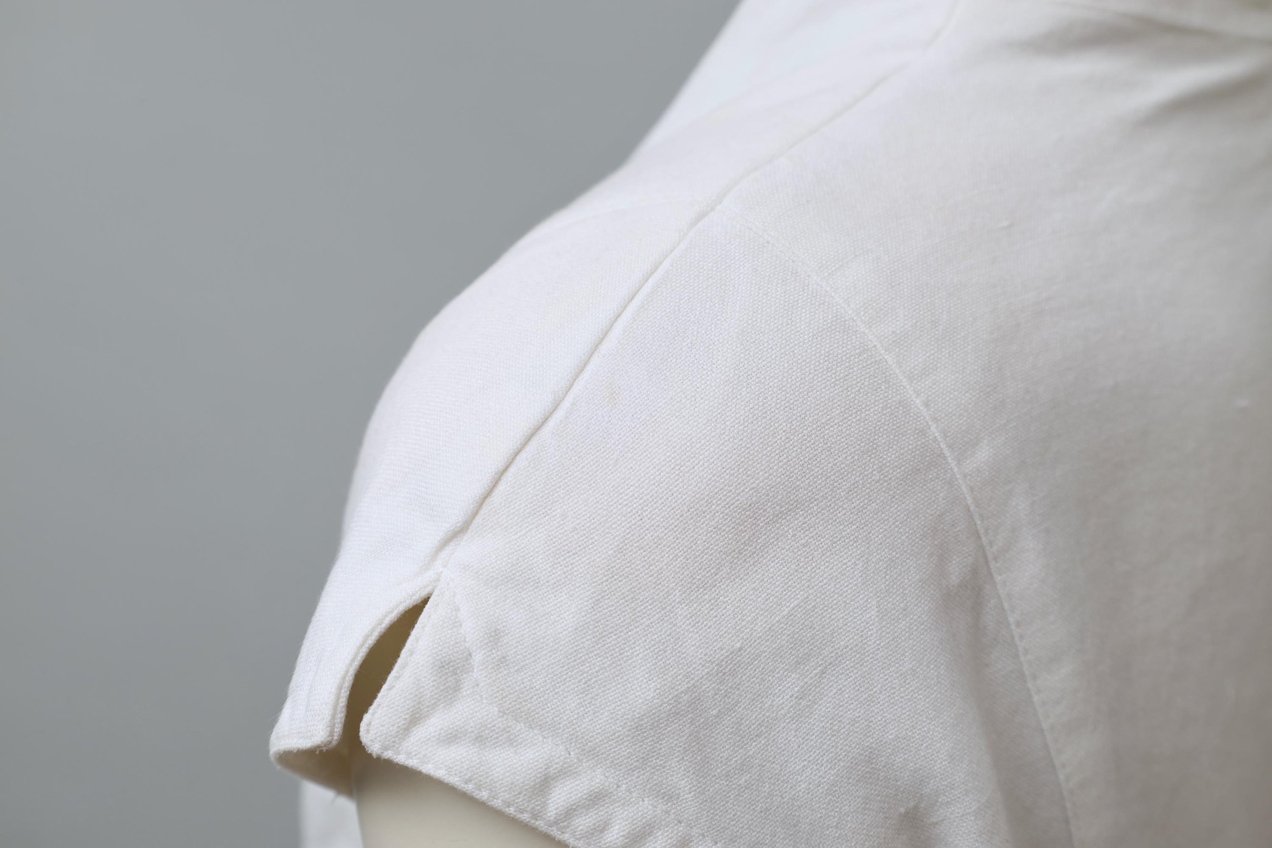 white cotton sleeve slit detail
