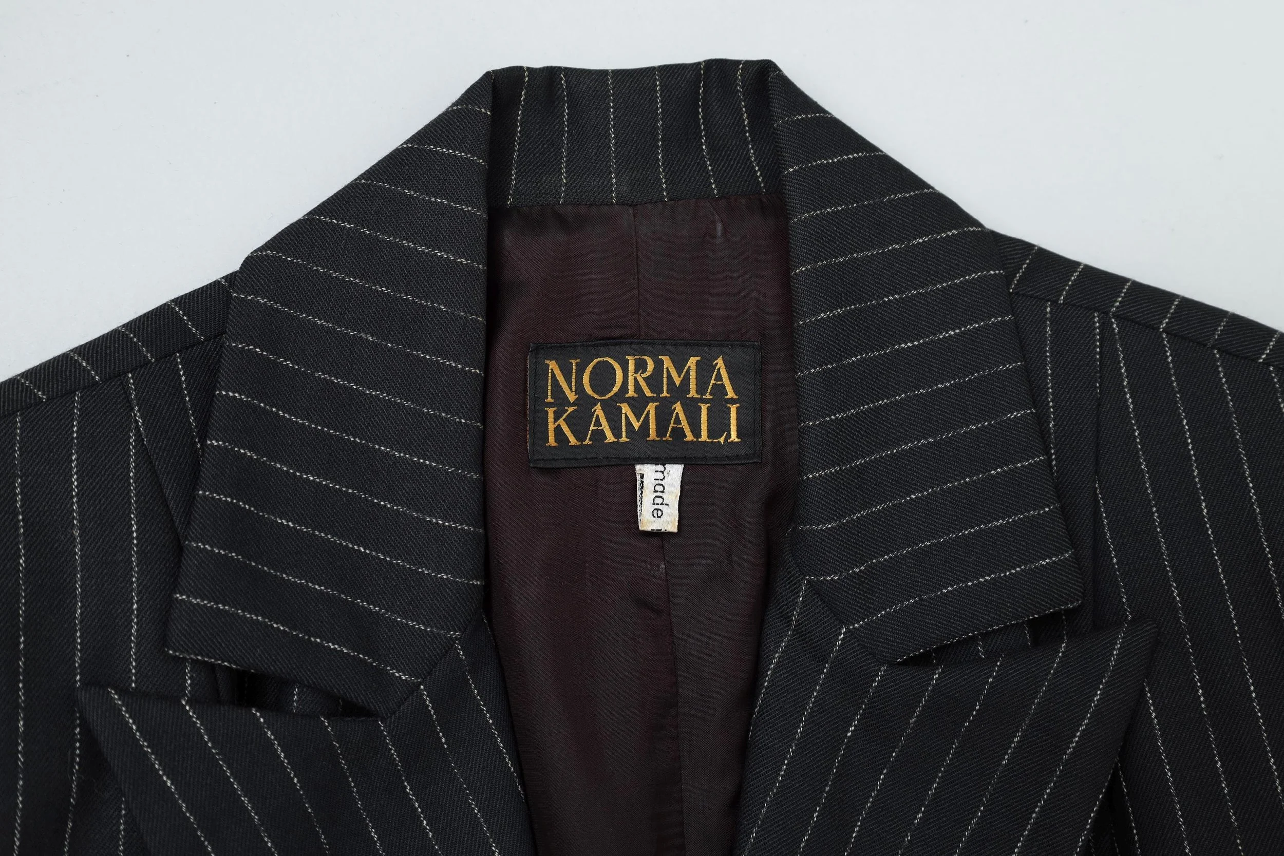 1990s Norma Kamali label tag