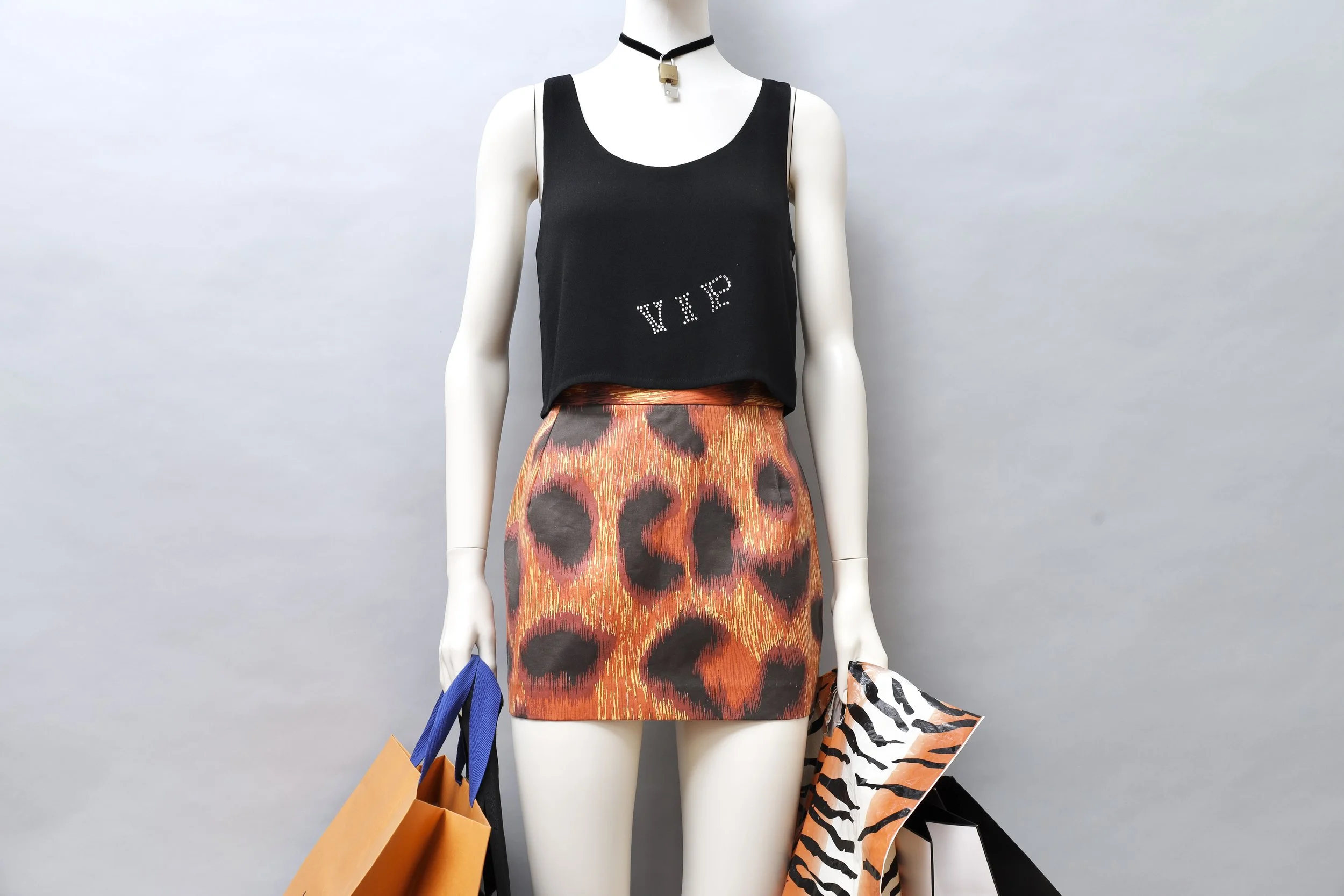 F/W 1984 Sonia Rykiel black crêpe rhinestone VIP cropped top and S/S 1994 Vivienne Westwood Café Society cheetah leopard mini skirt