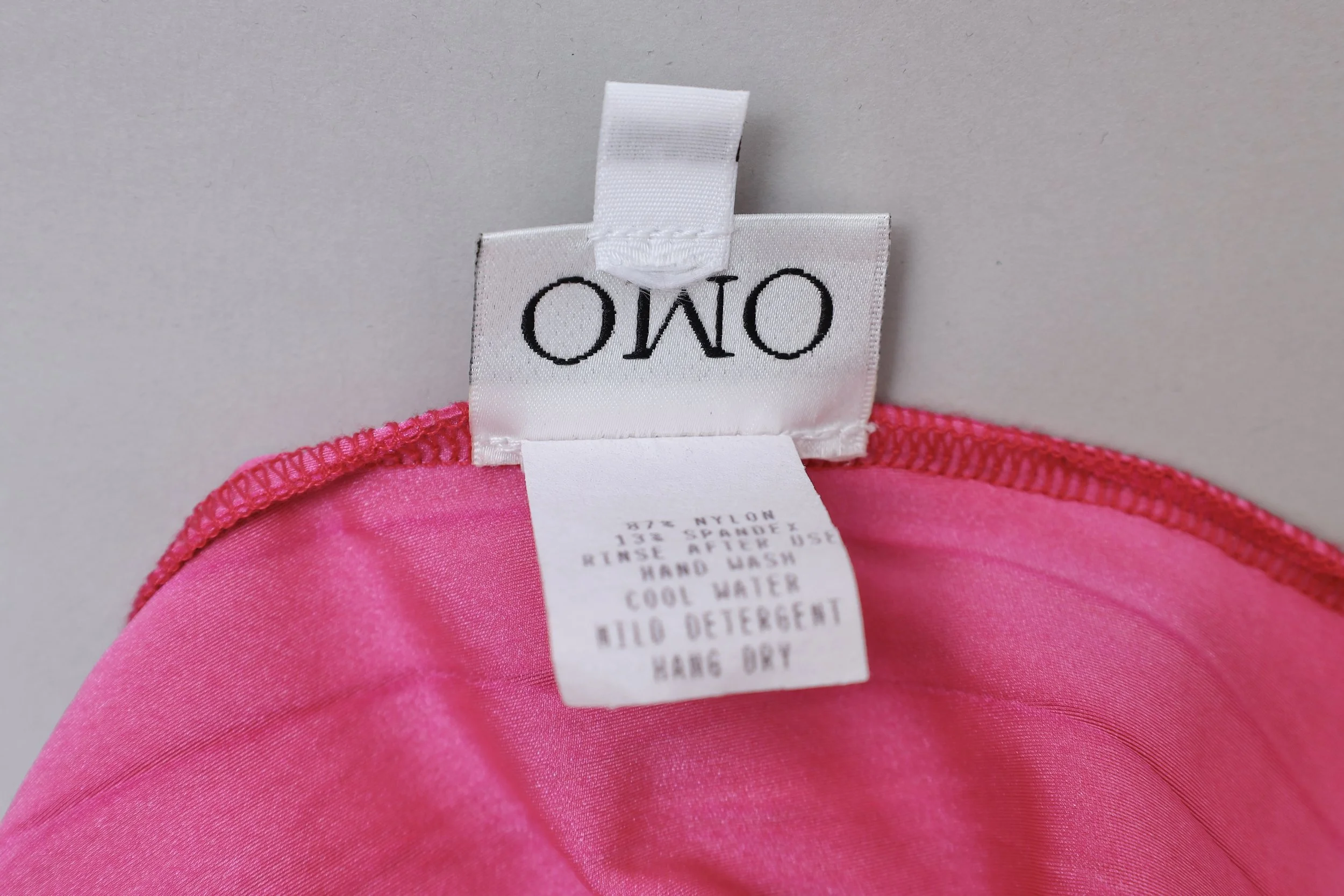 1990s OMO Norma Kamali label tag
