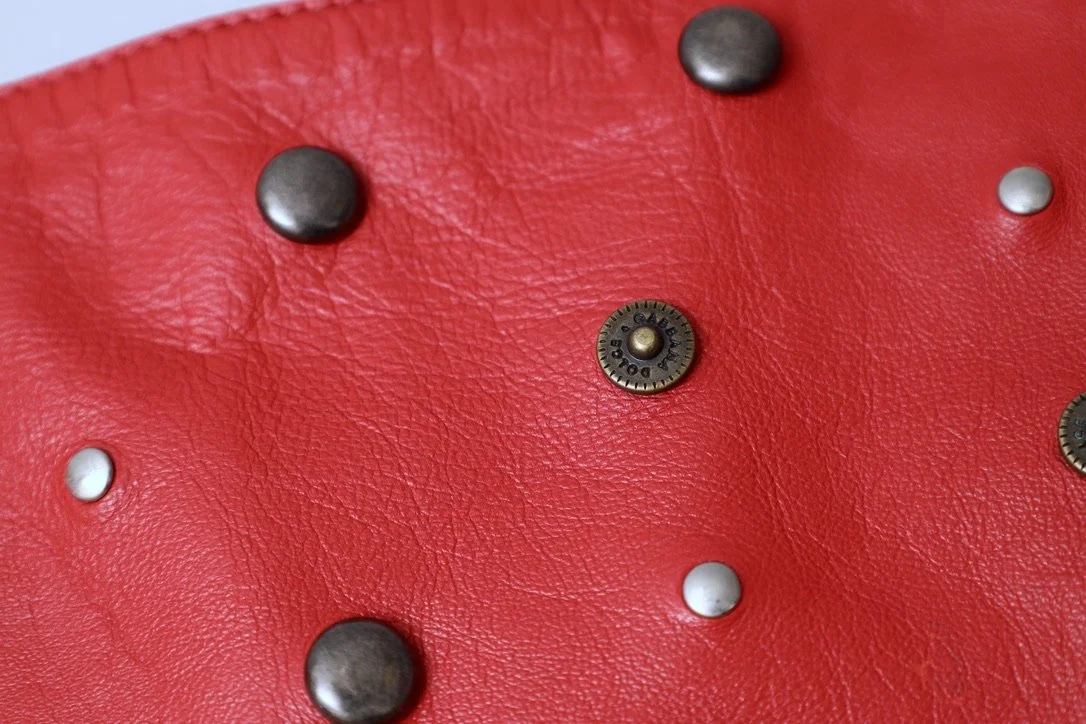 1990s Dolce & Gabbana crimson red 'LOVE and SEX' riveted leather sash belt