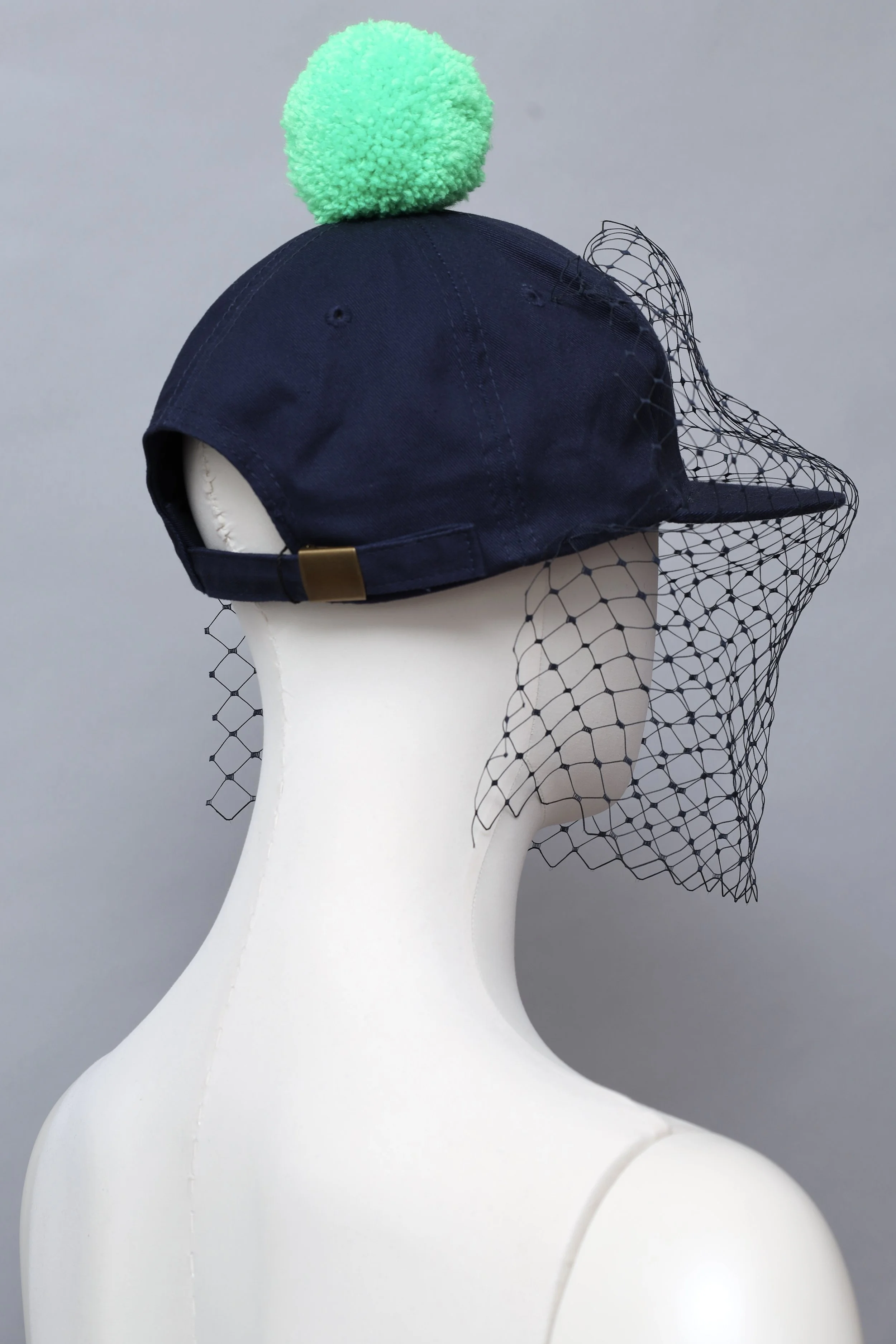 S/S 2016 Piers Atkinson navy blue veil baseball cap with acid green pom pom