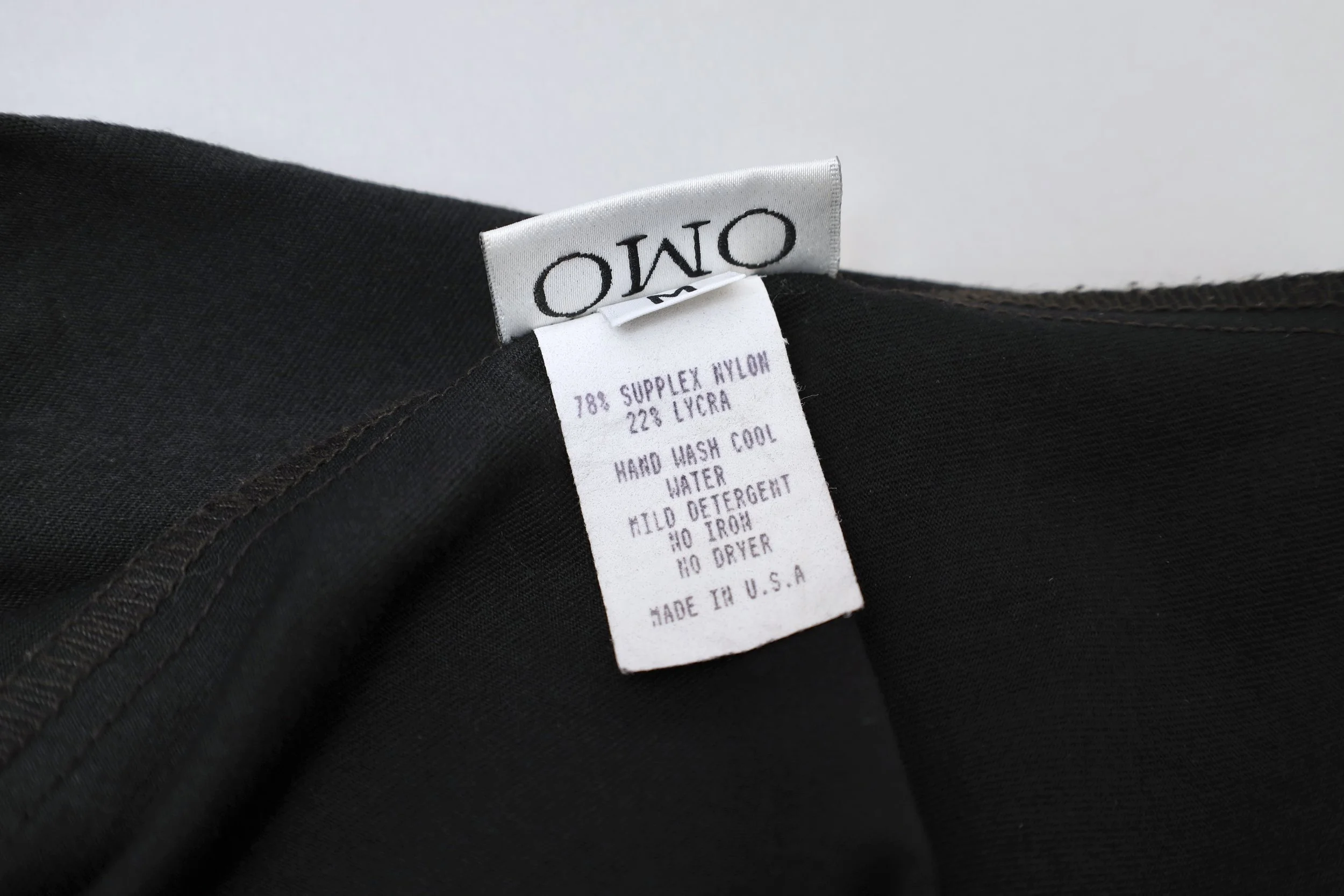1990s Norma Kamali OMO label tag