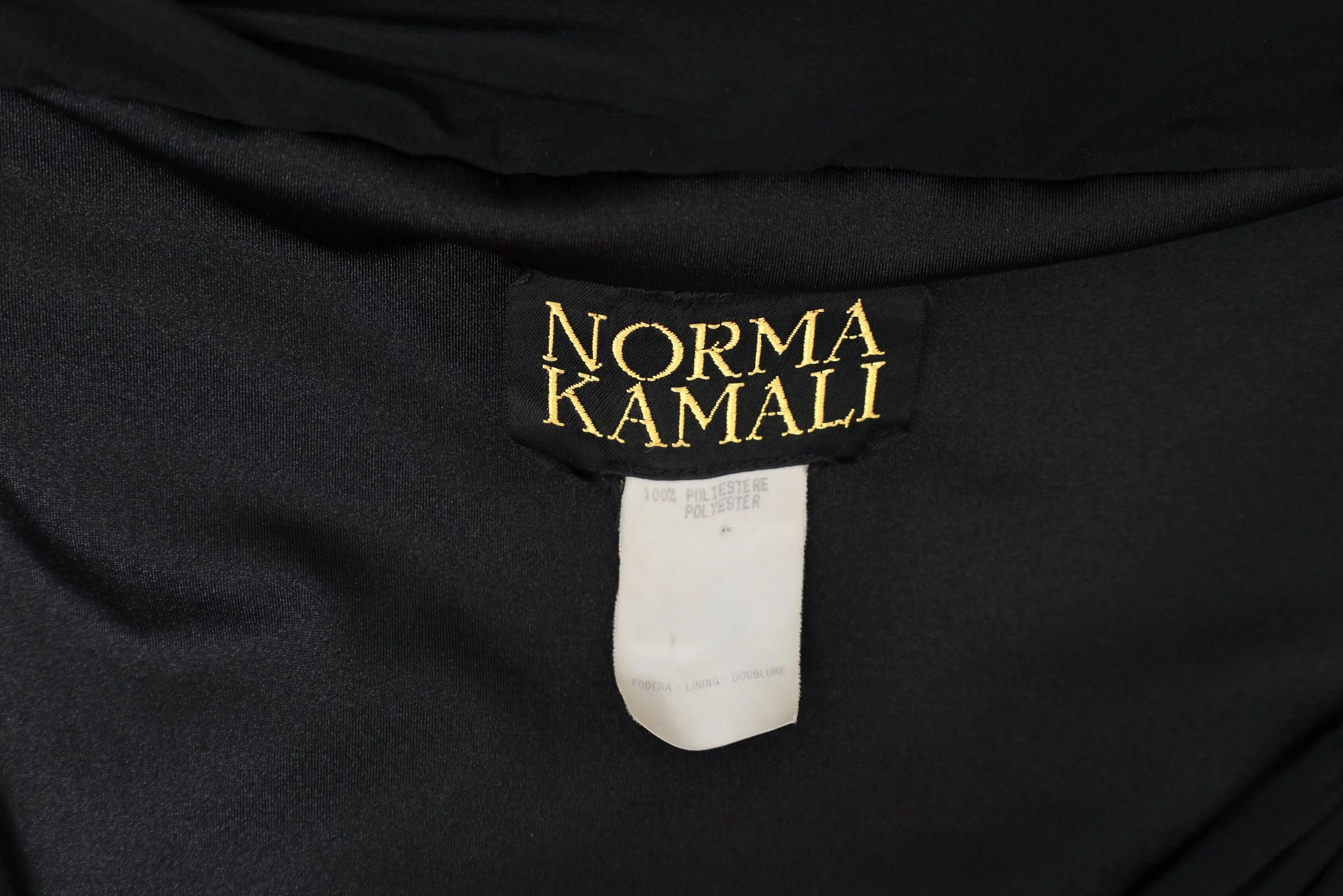 S/S 1990 Norma Kamali label tag