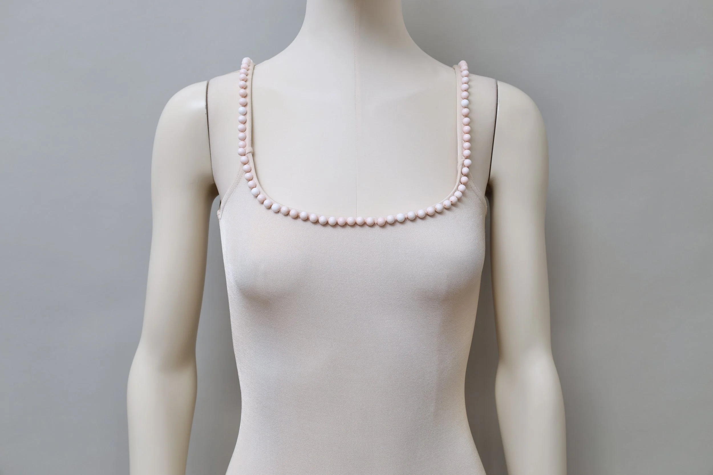 1990s Liza Bruce light peach pearl embellished stretch dress
