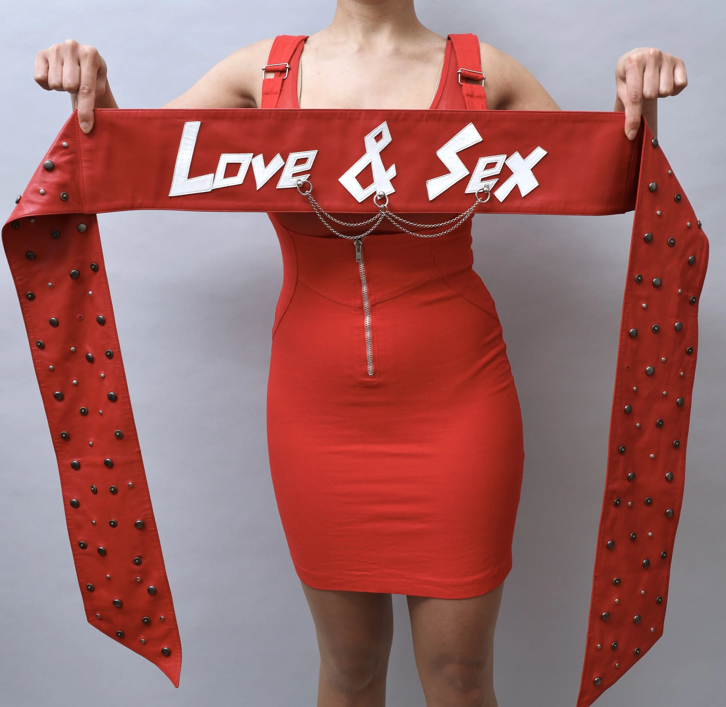 1990s Dolce & Gabbana crimson red 'LOVE and SEX' riveted leather sash belt