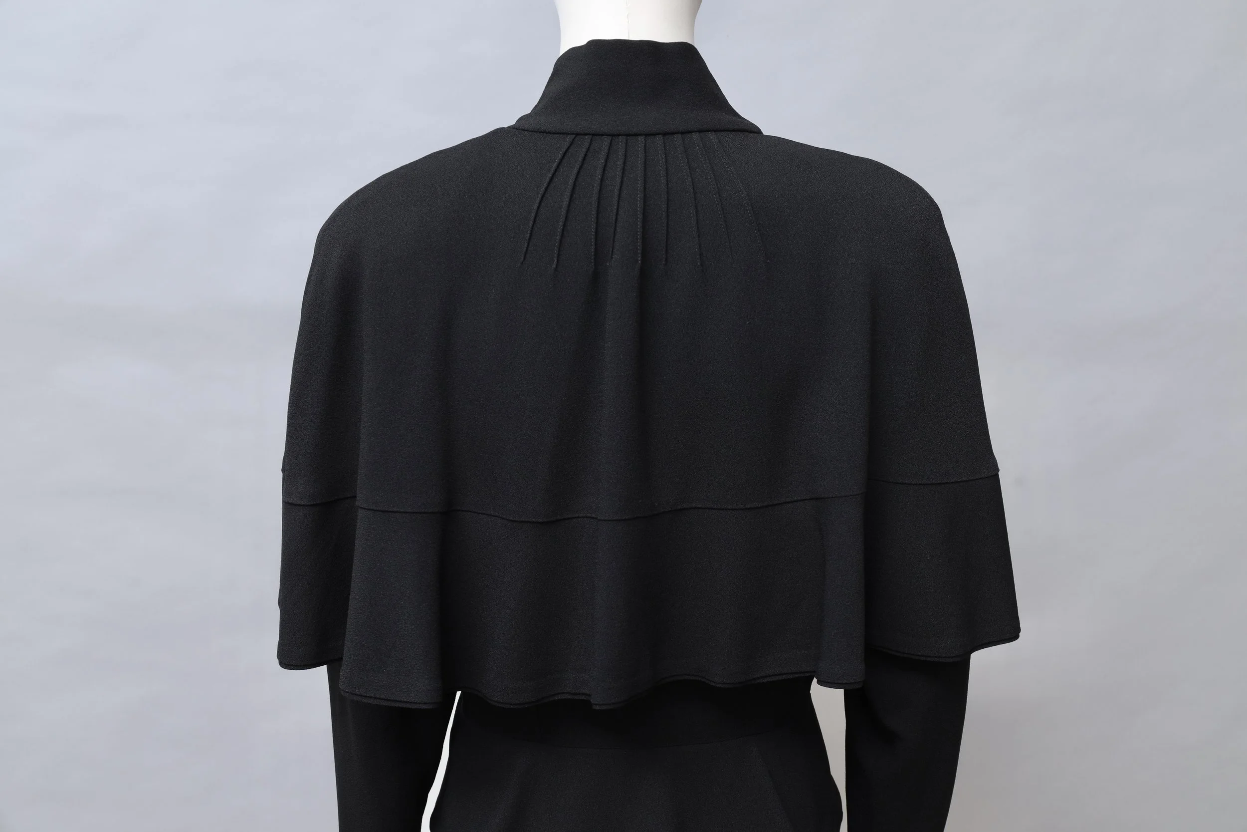 S/S 1988 Norma Kamali black capelet back