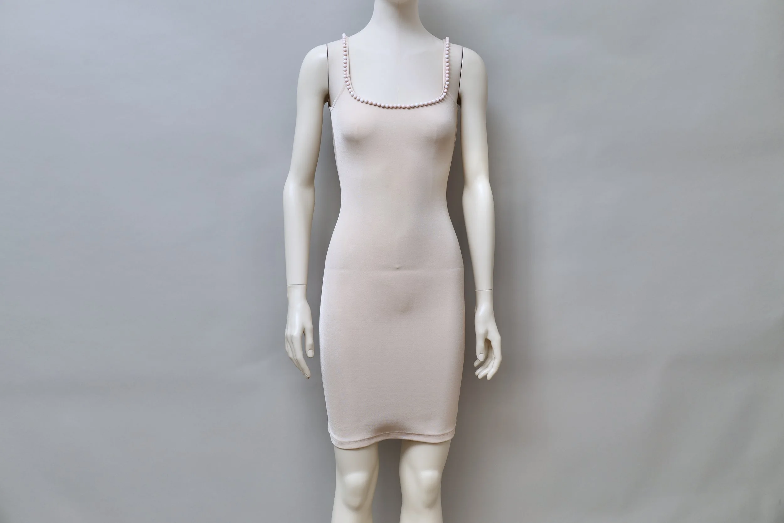 1990s Liza Bruce light peach pearl embellished stretch dress