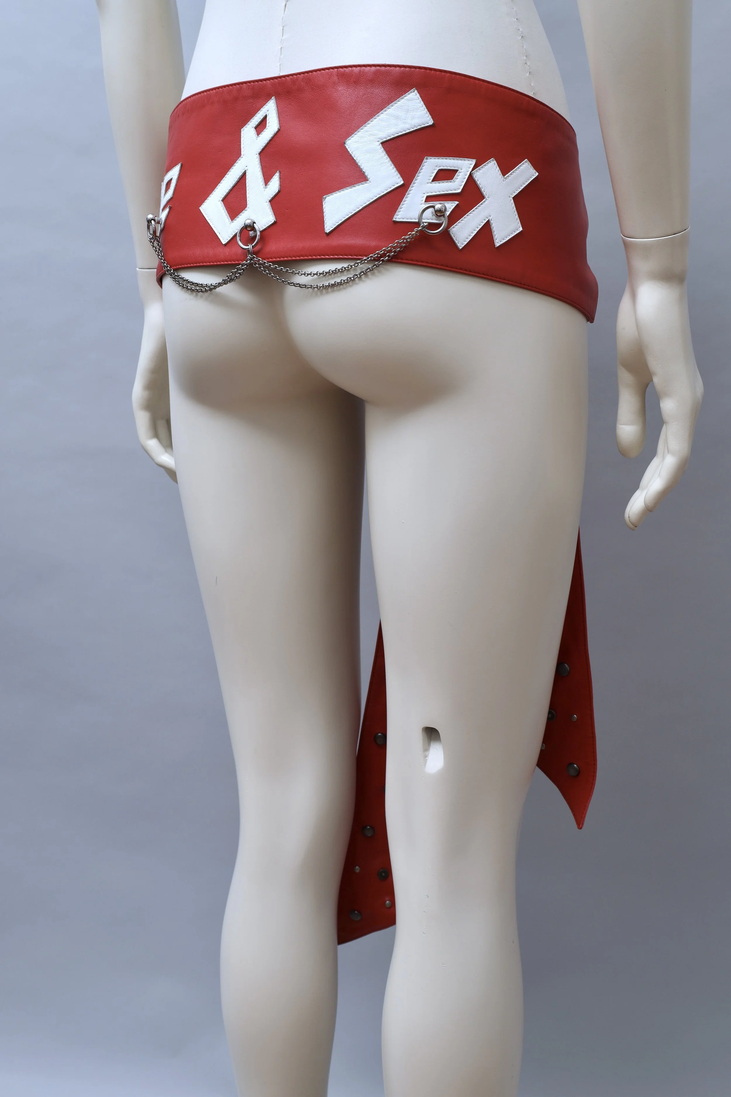 1990s Dolce & Gabbana crimson red 'LOVE and SEX' riveted leather sash belt